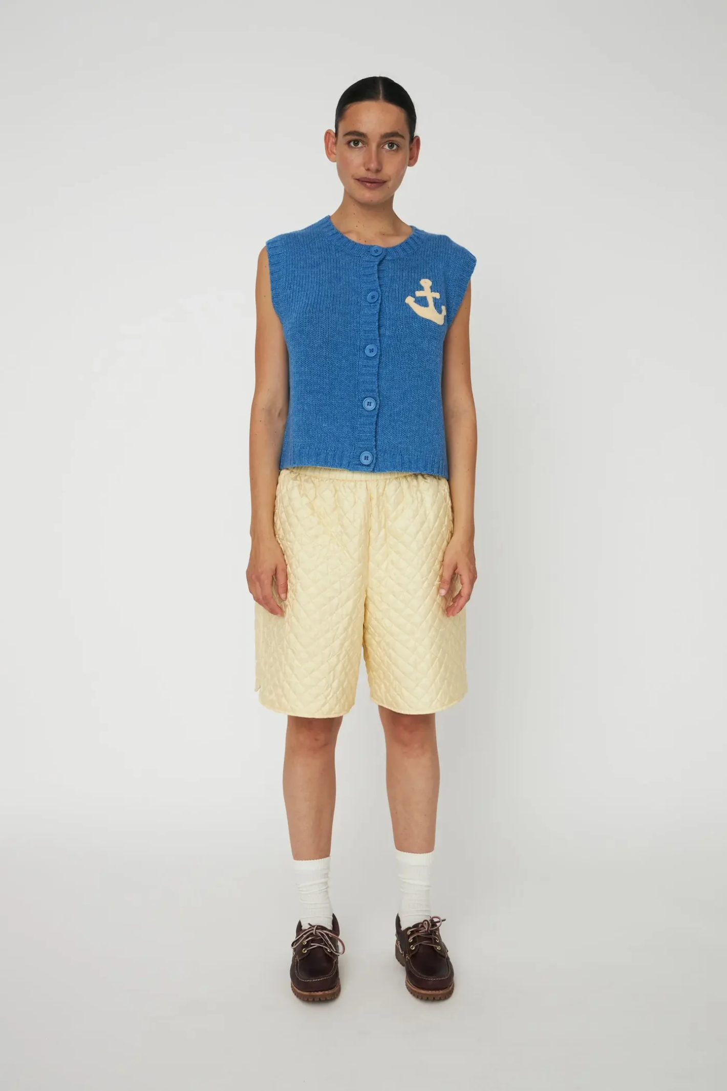 Model wearing Stella Nova Anchor Vest Blue Sea by stella nova, shop stella nova at Dotique in a sleeveless knit design