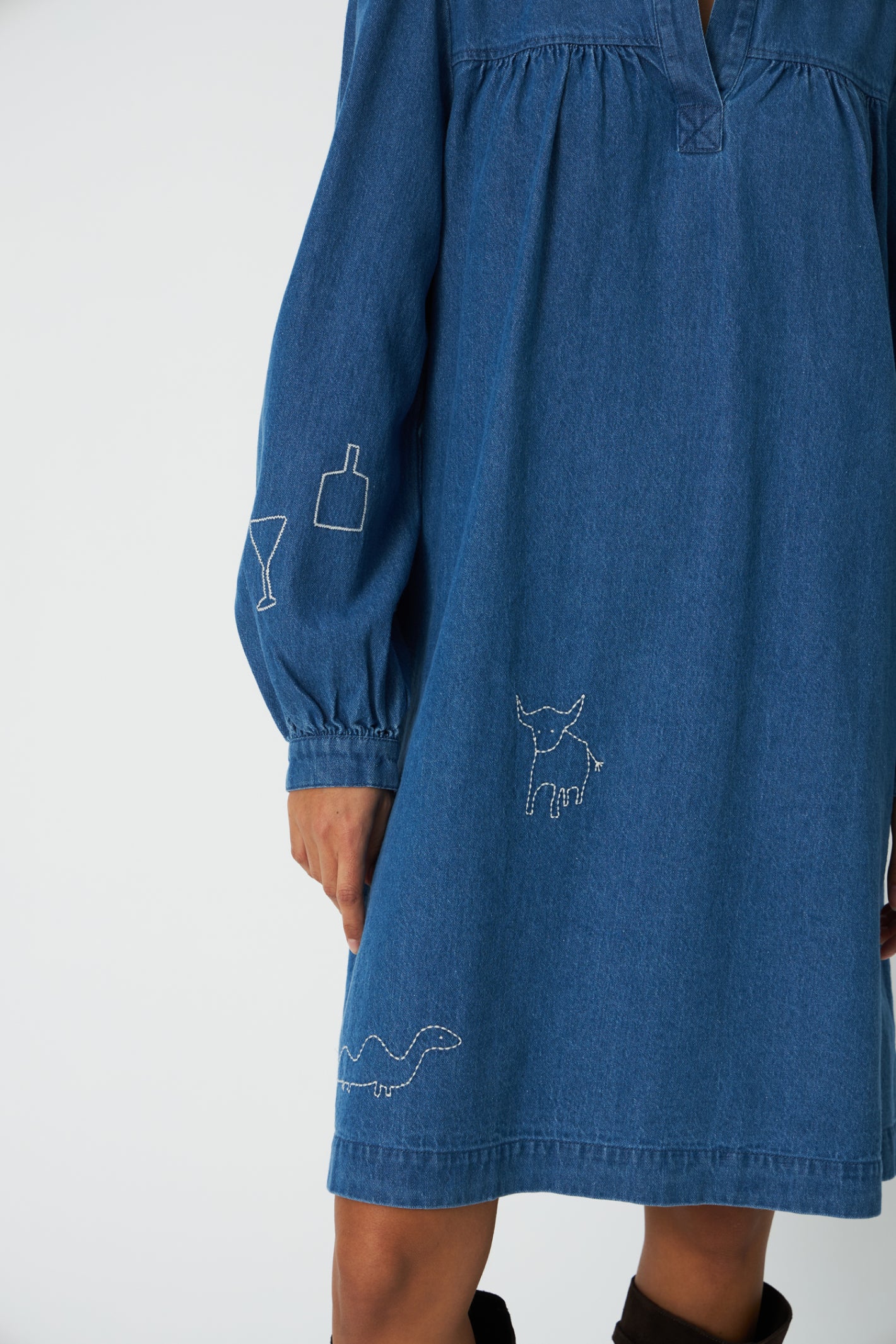 The Stella Nova Denim Dress with Artwork is the kind of piece that feels effortless but full of personality. Shop Stella Nova at Dotique.