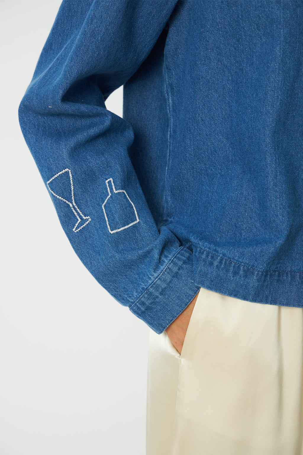 The Stella Nova Denim Shirt with Artwork takes a classic wardrobe staple and gives it a playful twist. Shop Stella Nova at Dotique.