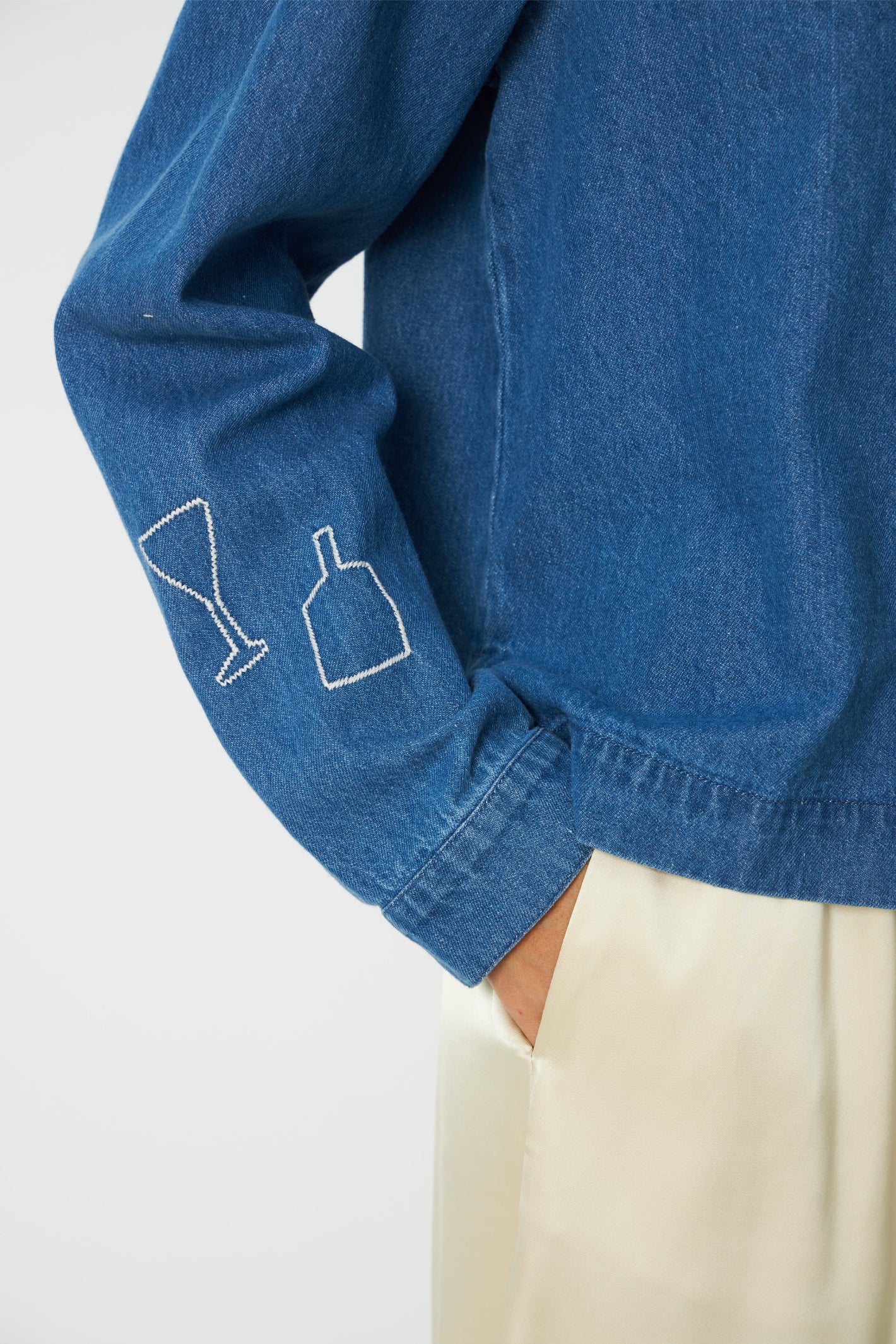 The Stella Nova Denim Shirt with Artwork takes a classic wardrobe staple and gives it a playful twist. Shop Stella Nova at Dotique.
