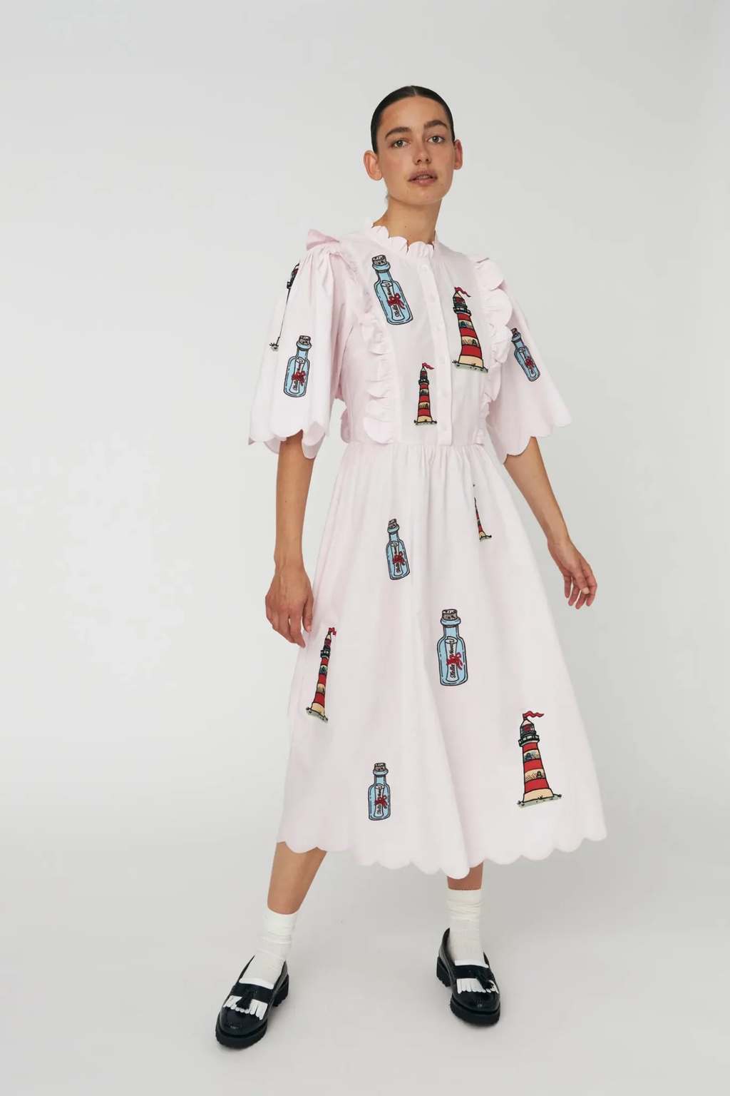 Model wearing Stella Nova Embroidered Midi Dress with Scallops Pale Pink by Stella Nova shop Stella Nova at Dotique gallery 1