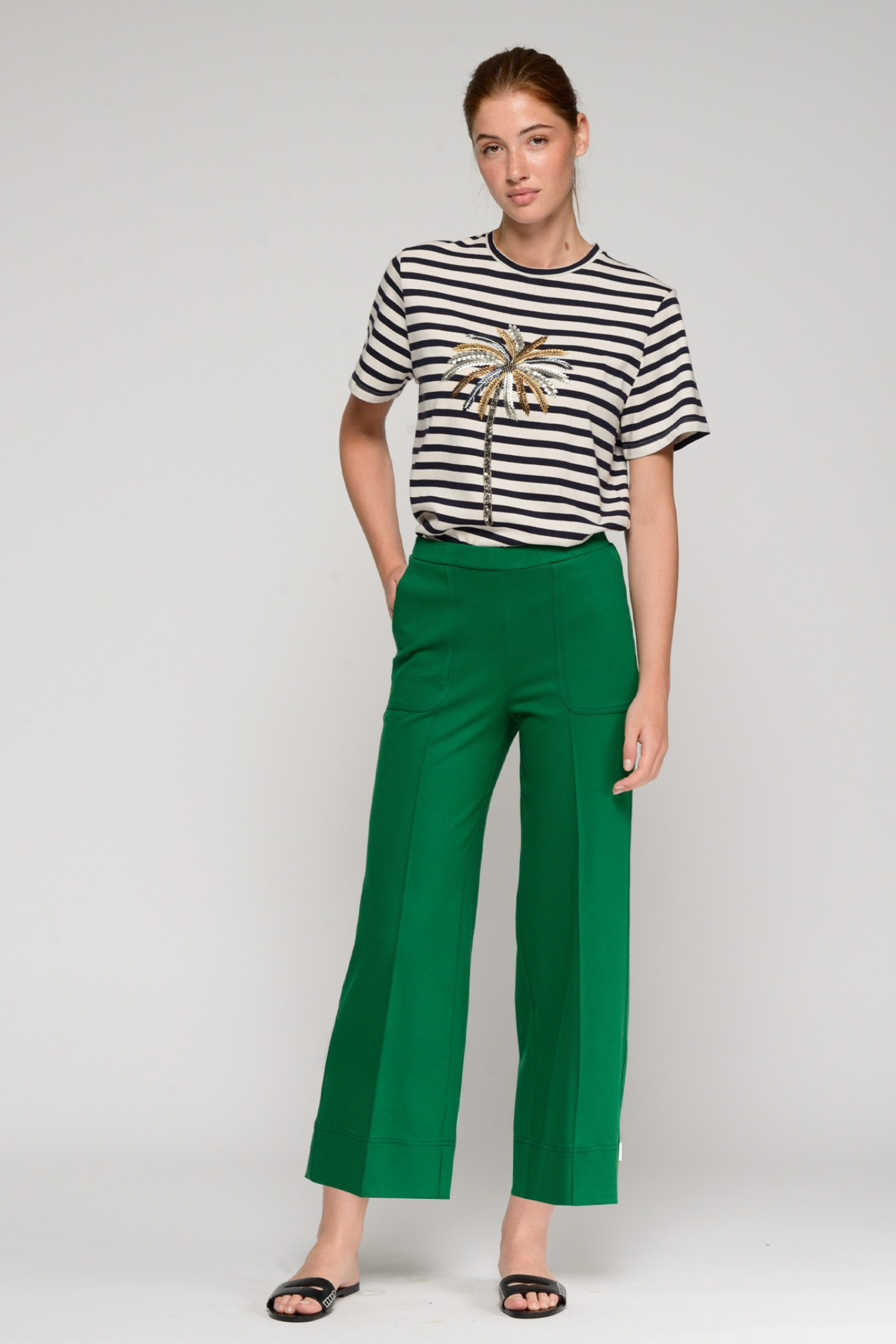 Model wearing Vilagallo 33640 Wide-Leg Green Trousers with Front Seams by vilagallo shop vilagallo at Dotique casual pose