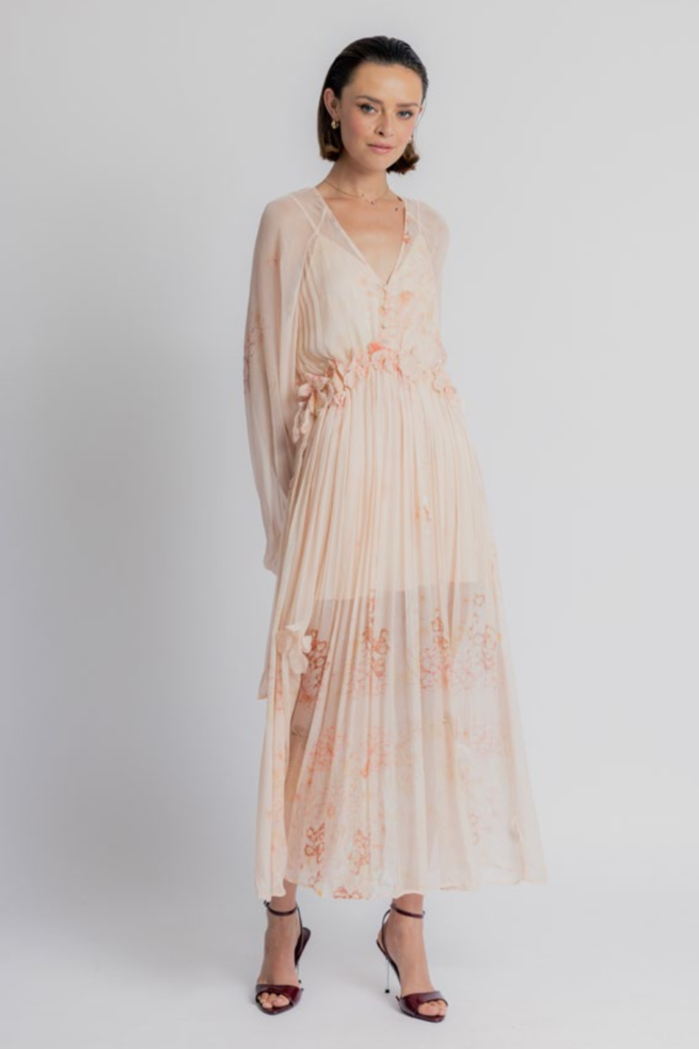 Woman wearing Dream Catcher Juniper Dress Salmon by Dream Catcher, shop the vendor now at Dotique online.