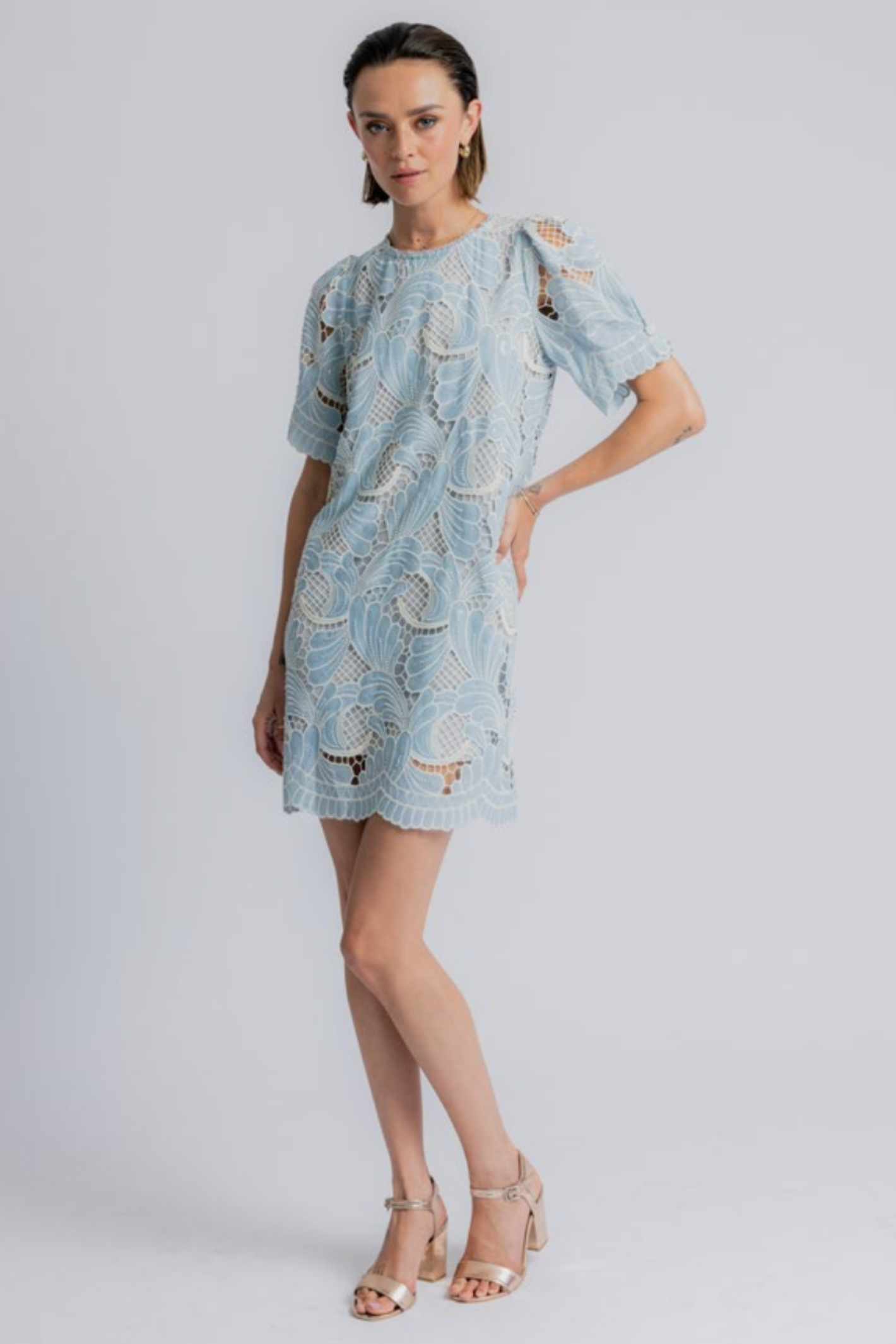 Model wearing the Dream Catcher Odelia Dress Blue by Dream Catcher in light blue lace, shop Dream Catcher at Dotique