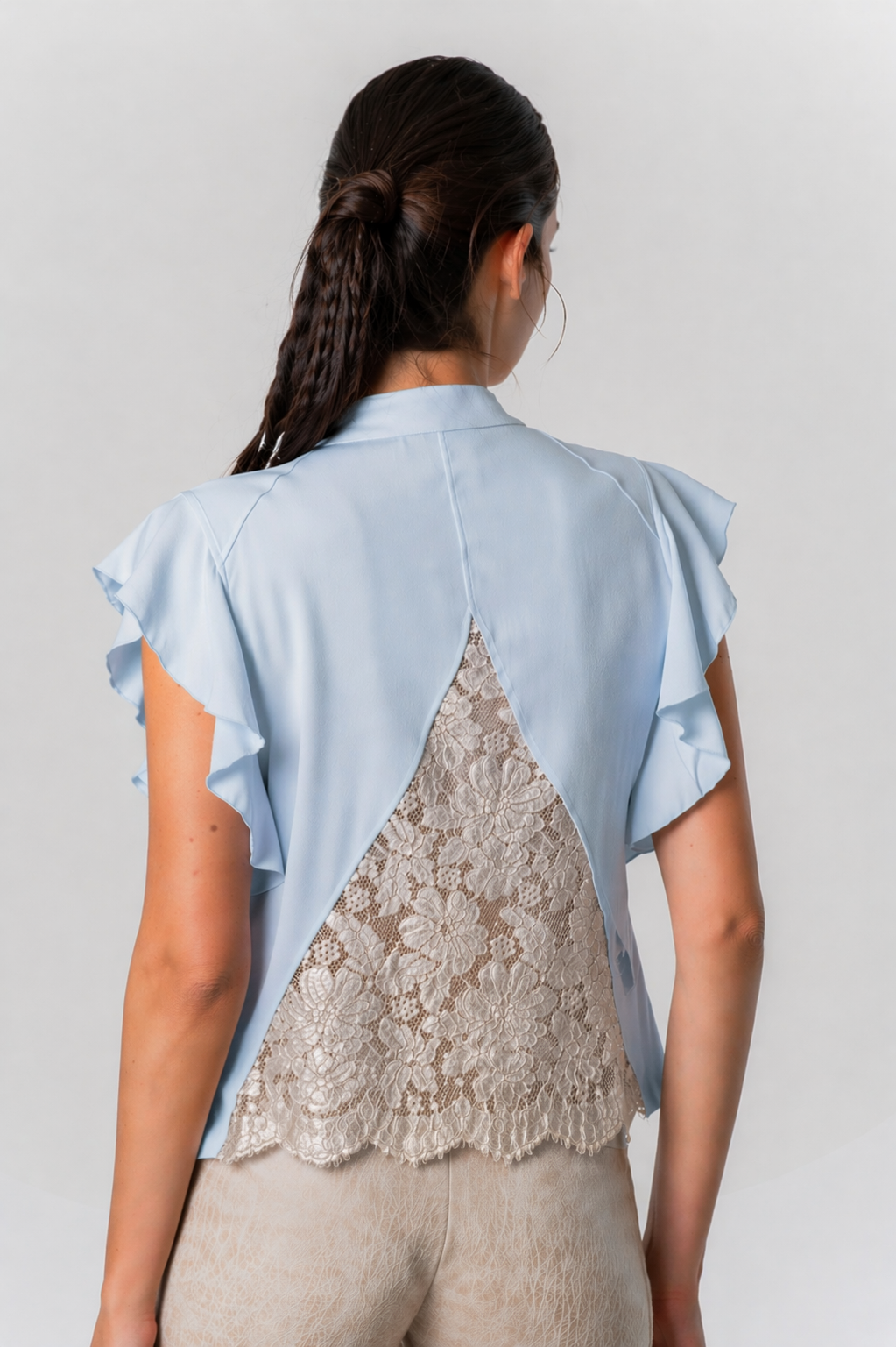Back view of model wearing Elisa Cavaletti Assisi Blue Ruffle Front Blouse EJP261069400 in light blue with lace detail, by Elisa Cavaletti, shop Elisa Cavaletti at Dotique.