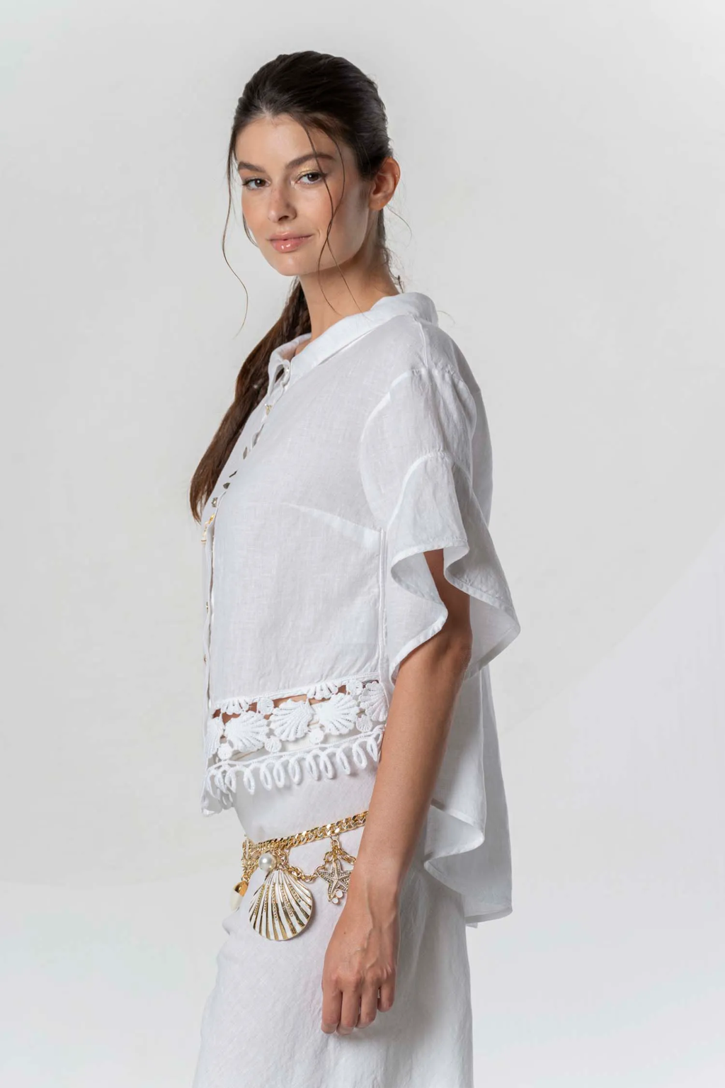 Model wearing Elisa Cavaletti Linen Lace Shirt White EAP261098205 with lace trim and ruffled sleeves by Elisa Cavaletti, shop Elisa Cavaletti at Dotique.