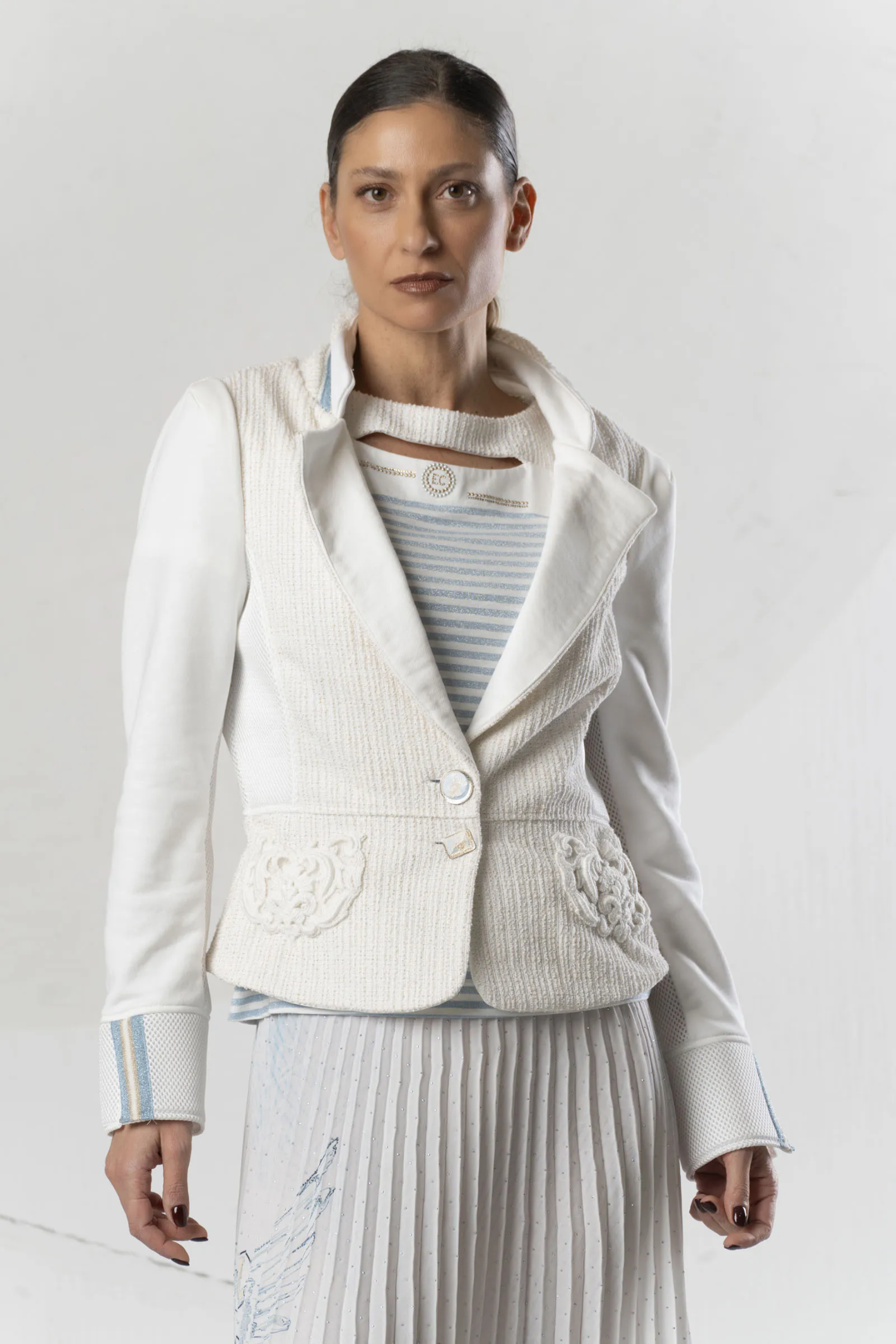 Model wearing Elisa Cavaletti White Lurex Stripe T-Shirt with Light Blue Detail EJP265002808 by Elisa Cavaletti, shop Elisa Cavaletti at Dotique.
