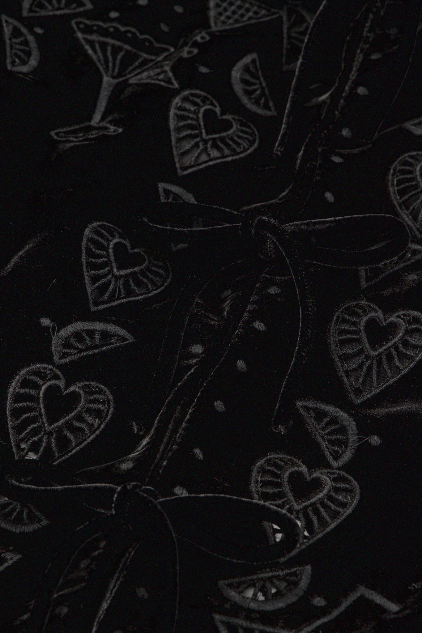 Fabienne Chapot black velvet top with embroidered motifs, tie front, and scalloped sleeves front view – Dotique

