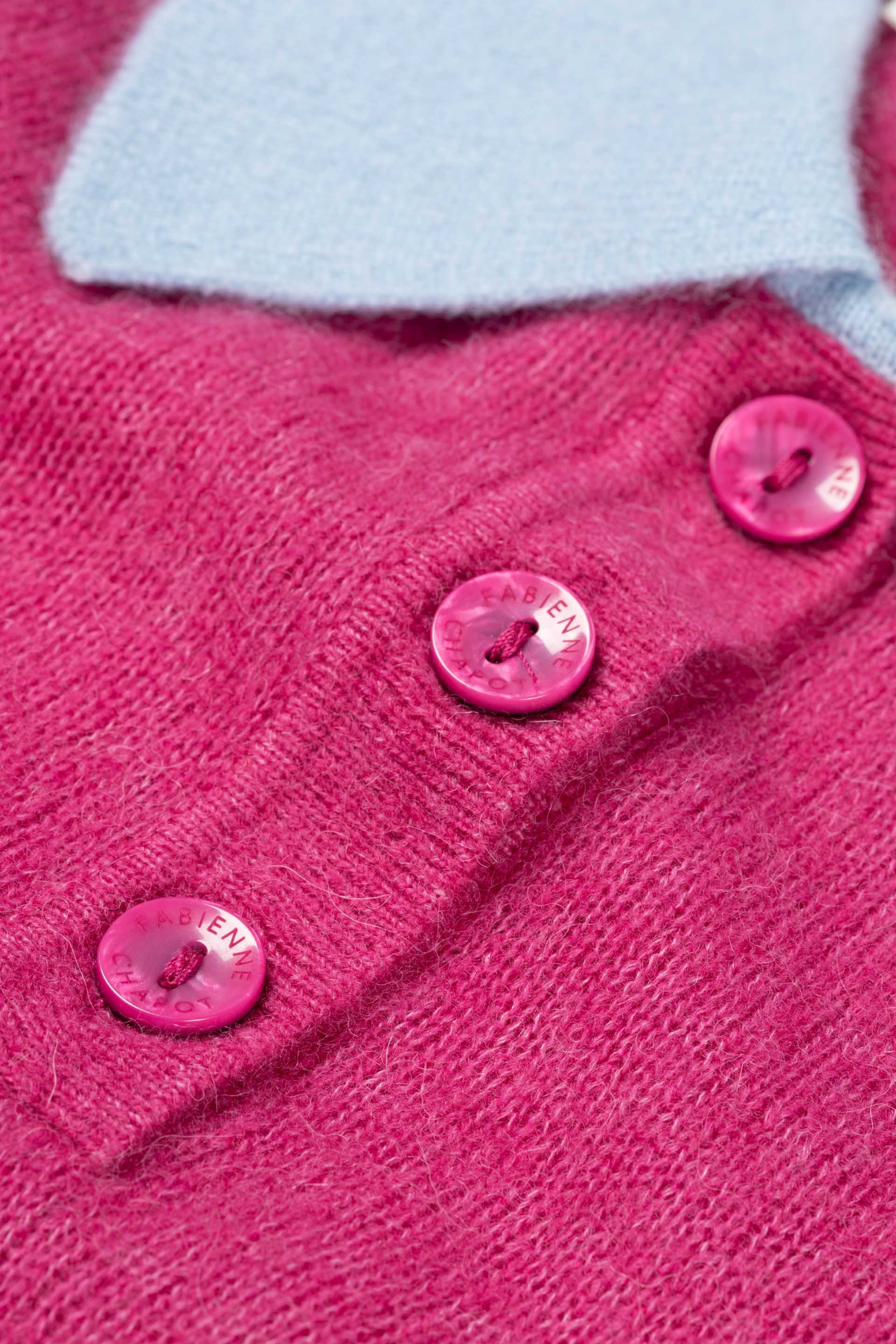 Close-up of pink buttons on Fabienne Chapot Barbara Pullover Fab Fucshia by Fabienne Chapot, shop Fabienne Chapot at Dotique.