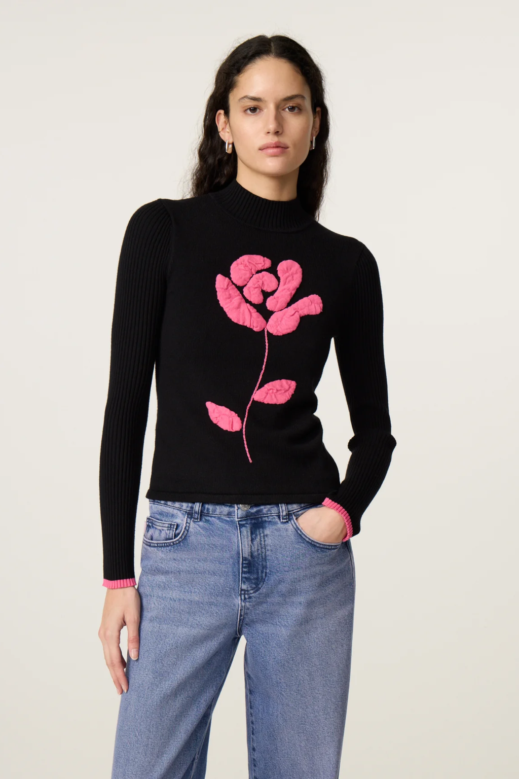 Model wearing Fabienne Chapot Courtney Rose Pullover Black, featuring pink rose design; shop Fabienne Chapot at Dotique.