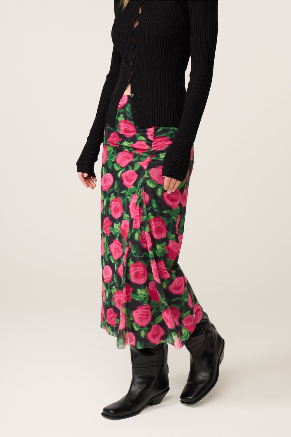 Model wearing Fabienne Chapot Jessy Midi Skirt Fab Fuchsia/Black with black top and boots, shop Fabienne Chapot at Dotique