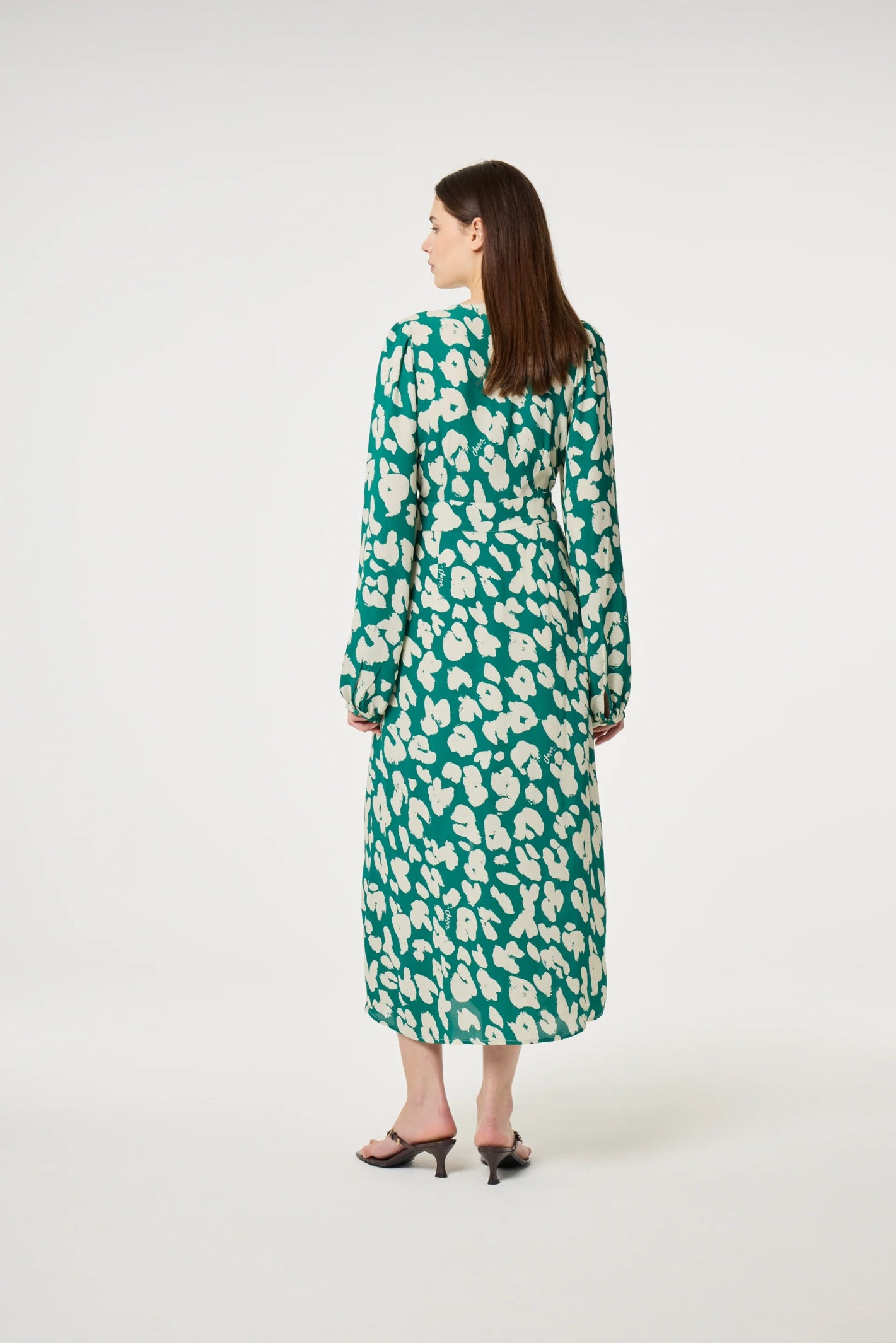 Woman wearing Fabienne Chapot Ana Dress Evergreen/Cosy White with floral print, shop Fabienne Chapot at Dotique online store