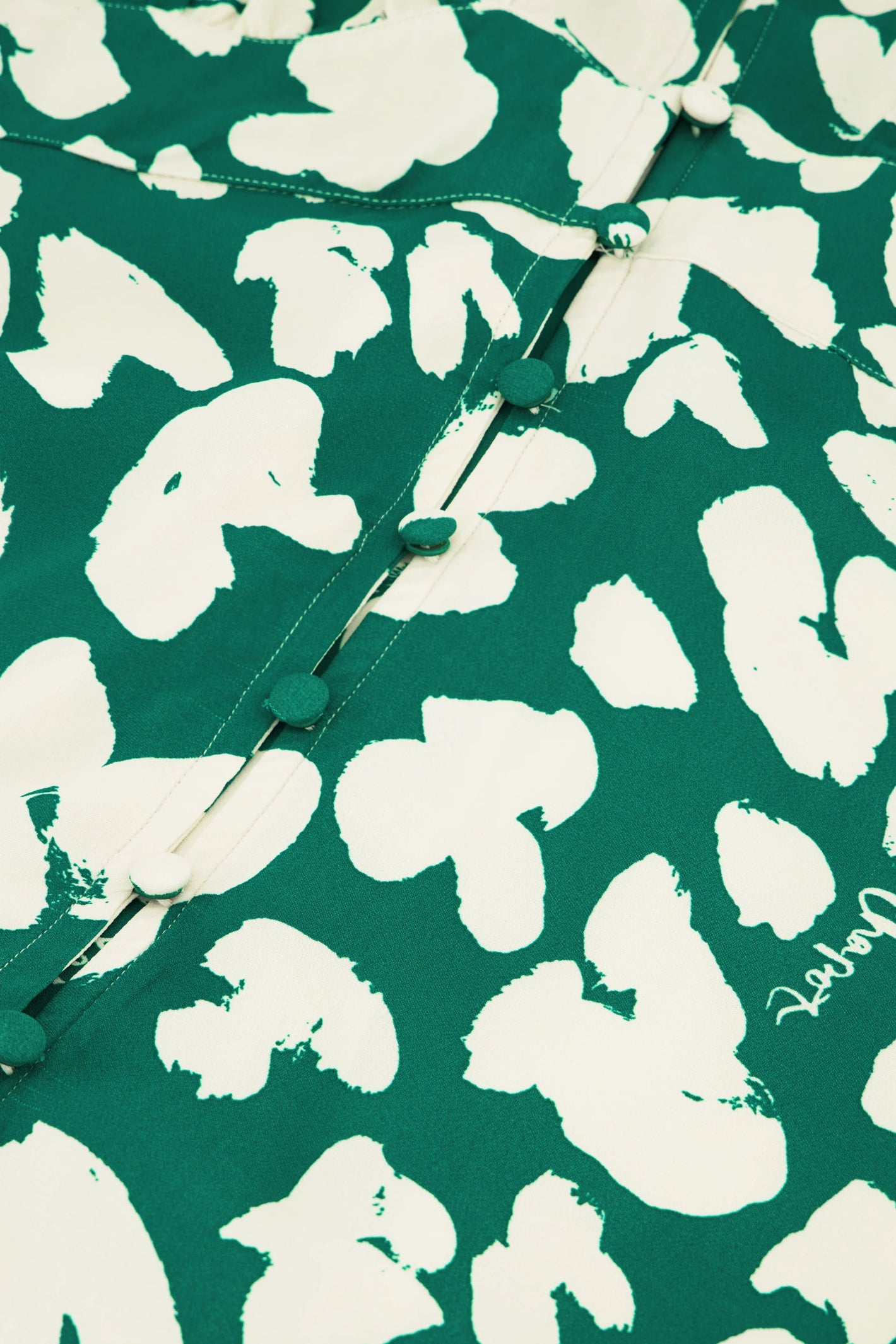 Close-up of Fabienne Chapot Ana Dress Evergreen/Cosy White fabric pattern and buttons, shop Fabienne Chapot at Dotique