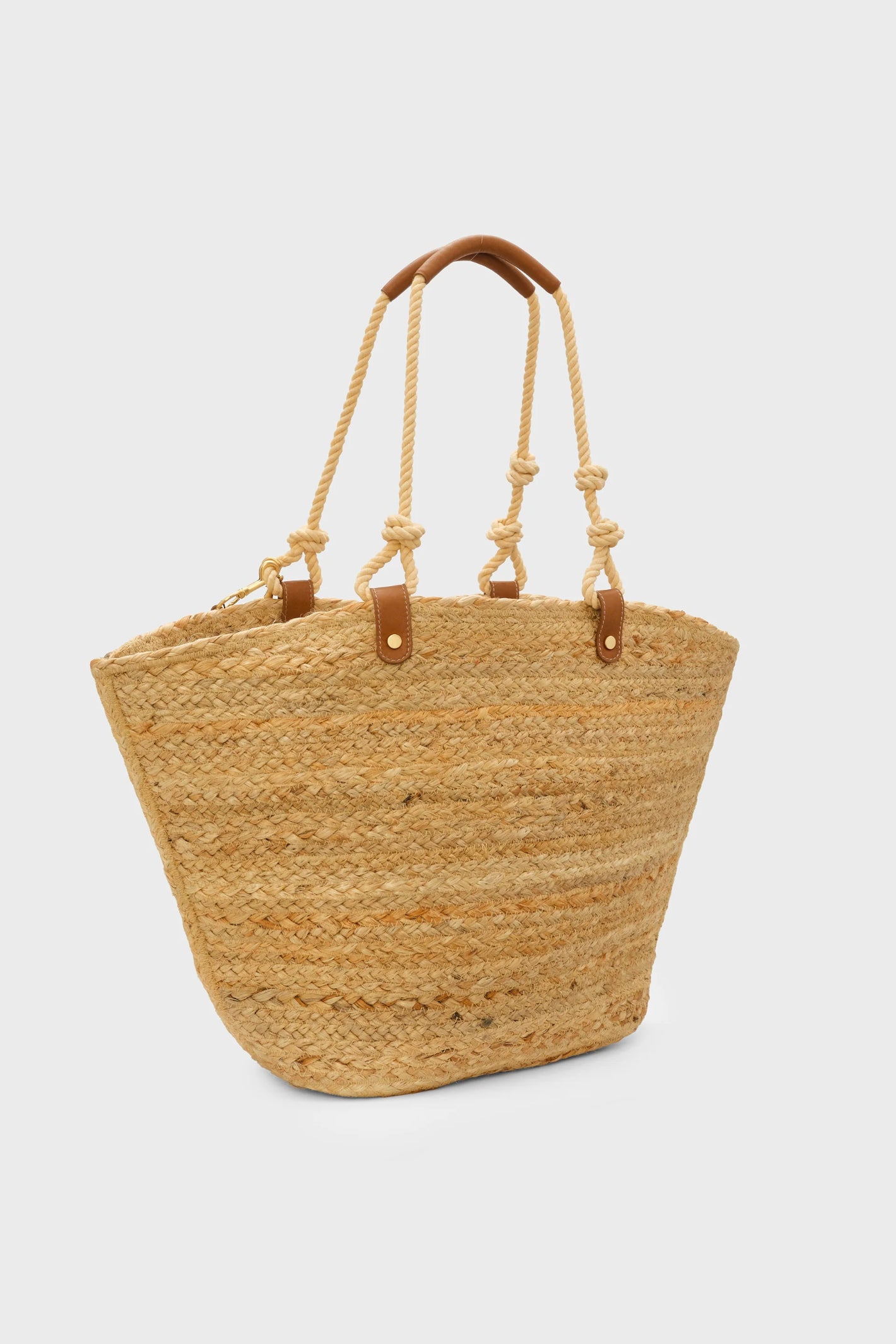 Angled view of Fabienne Chapot Nico At Sea Bag Sand with rope handles by Fabienne Chapot Shop Fabienne Chapot at Dotique