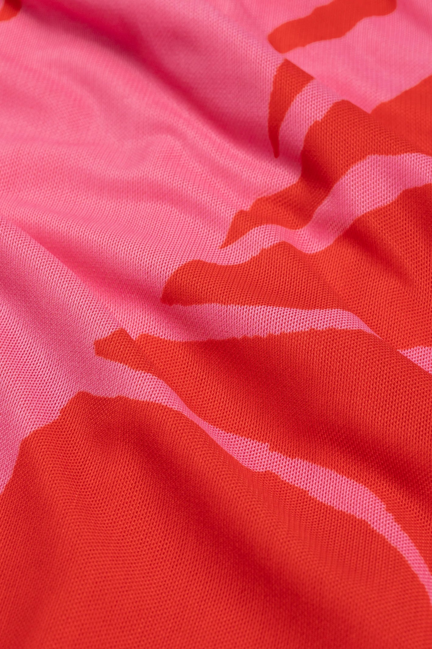 Close-up of red and pink fabric pattern of Fabienne Chapot Sionara Dress Red/Pink, shop Fabienne Chapot at Dotique