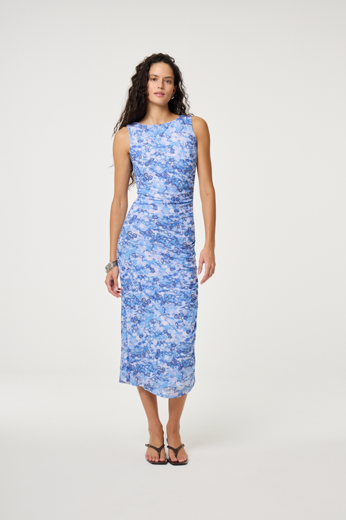 Model wearing Fabienne Chapot Zina Dress Sea of Sunglasses Blue featuring a sleeveless, fitted silhouette by Fabienne Chapot, shop Fabienne Chapot at Dotique.