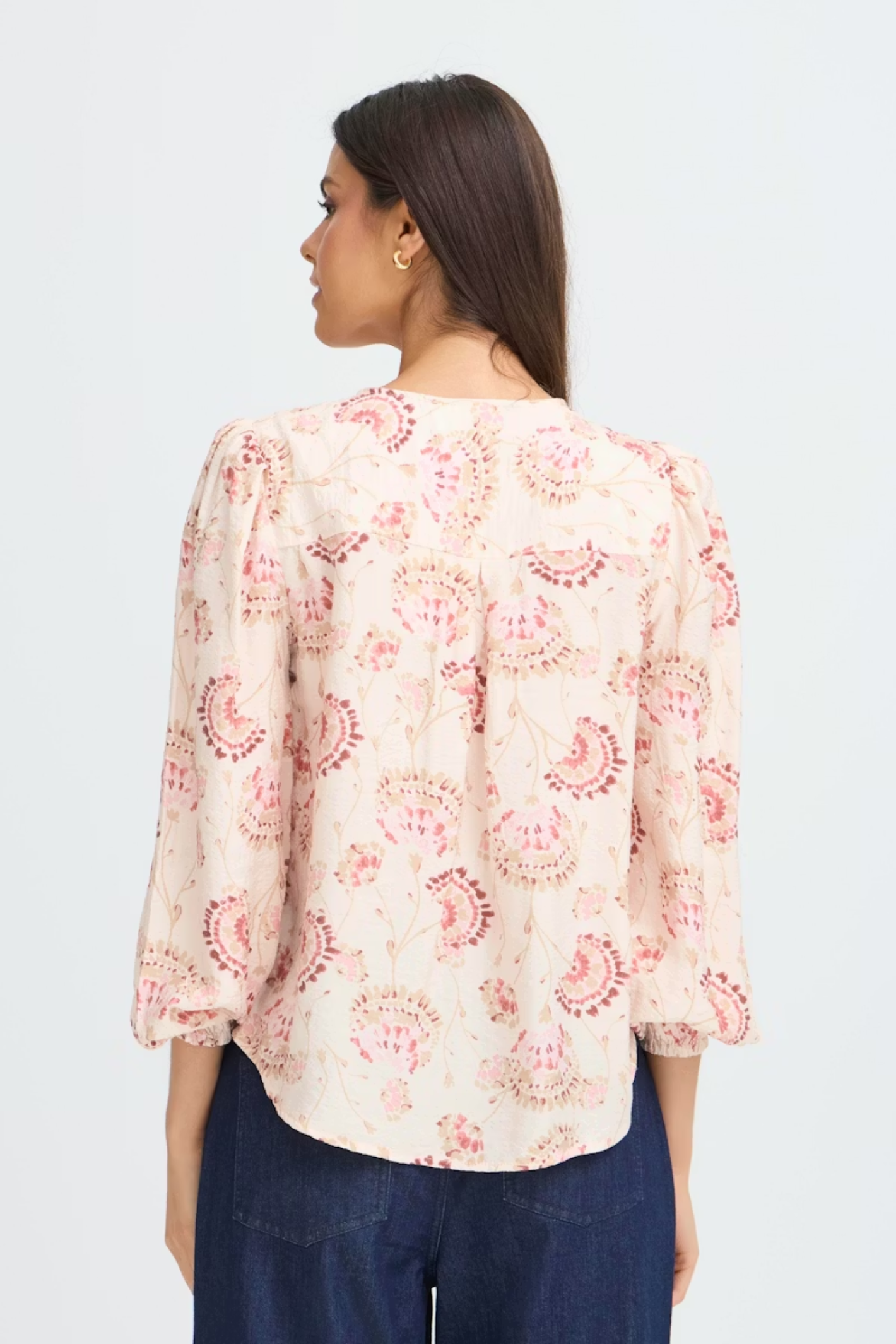 Fransa orchid floral V-neck blouse with long sleeves and soft drape at Dotique Peak Village