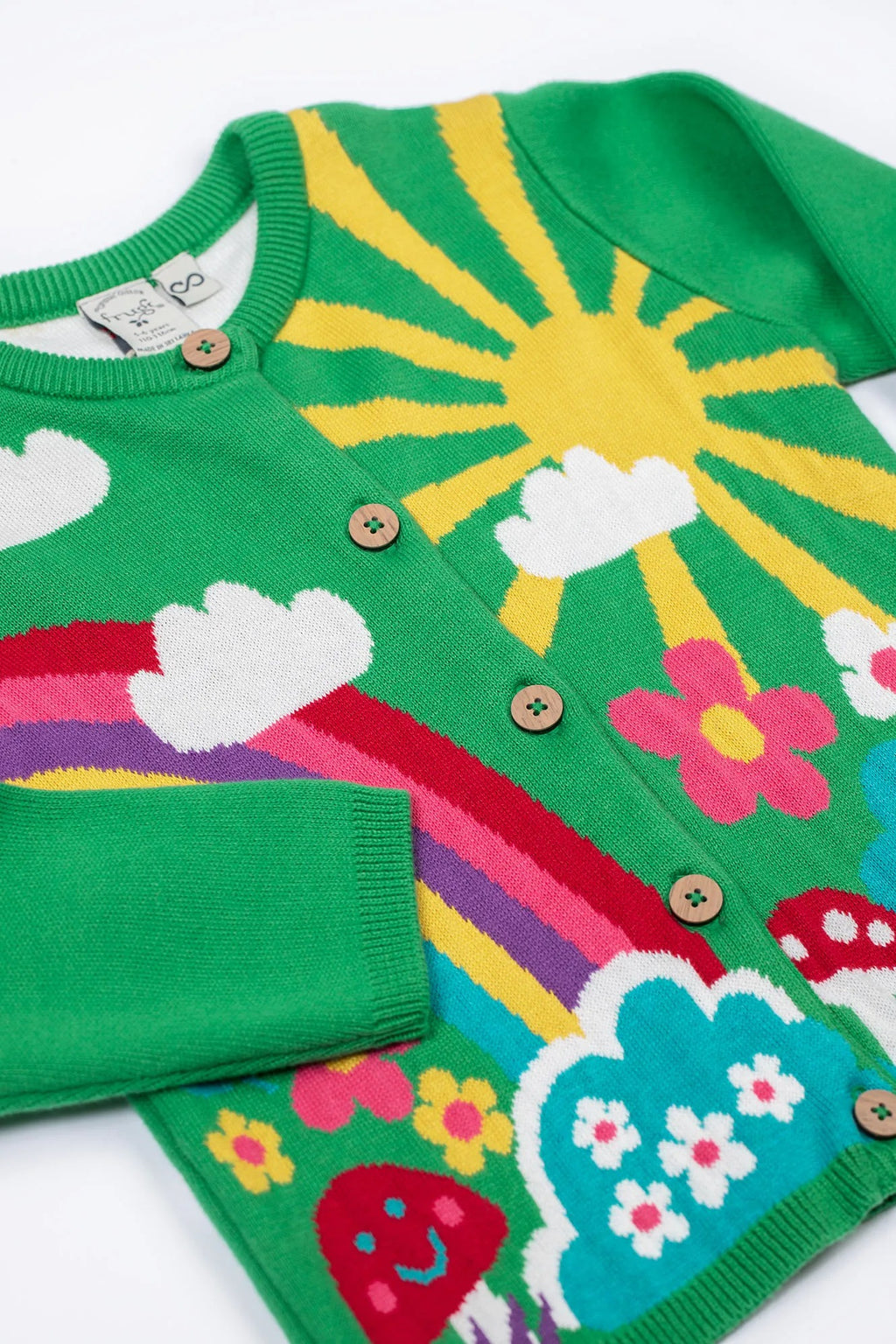 Colorful children's cardigan with sun, rainbow, and cloud design on a white background