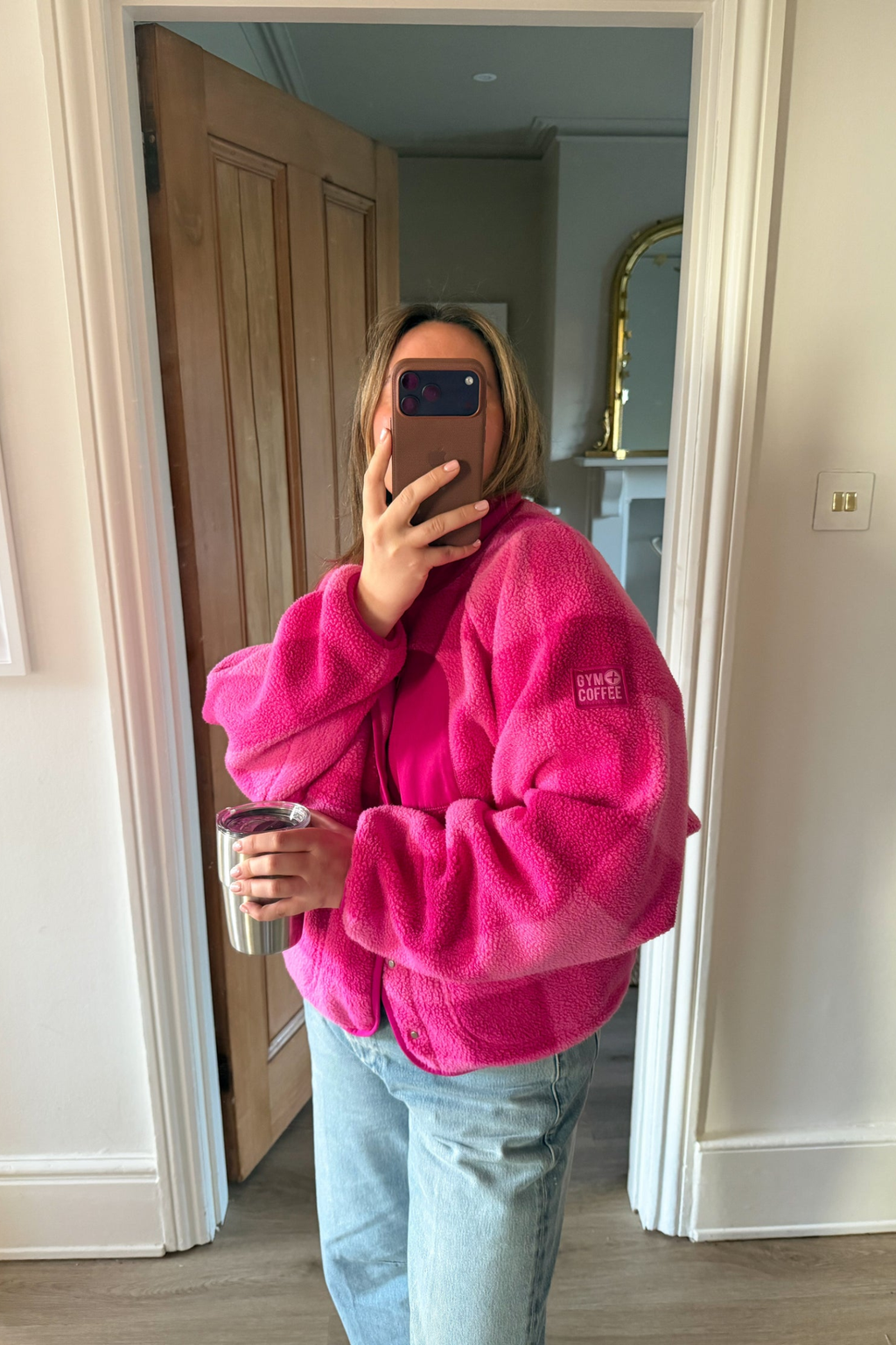 Gym+Coffee Horizon Layer Up Jacket in pink gingham print. Boxy fit, funnel neck and zip pockets. Easy everyday layer. Shop online at Dotique.