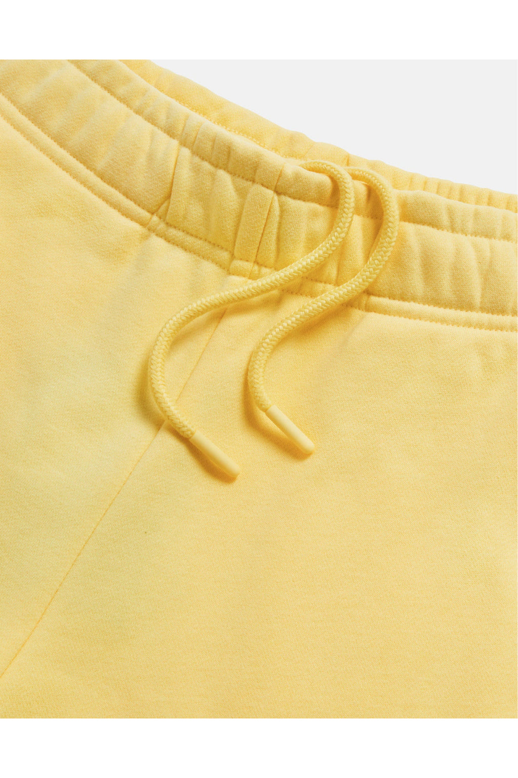 Close-up of drawstring and waistband on Gym+Coffee Daily Cotton Shorts in Lemon Sorbet, shop Gym+Coffee at Dotique