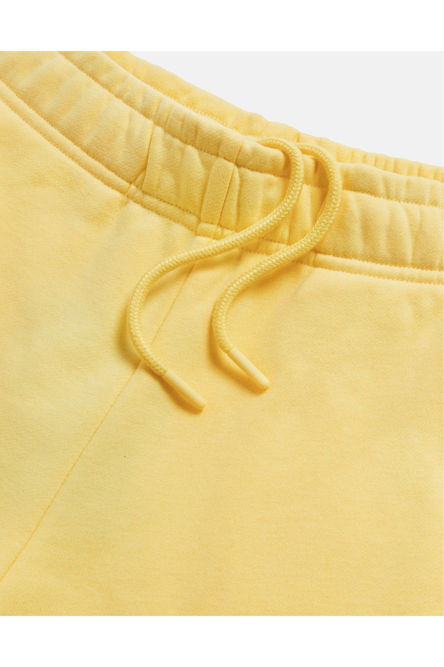 Close-up of drawstring and waistband on Gym+Coffee Daily Cotton Shorts in Lemon Sorbet, shop Gym+Coffee at Dotique