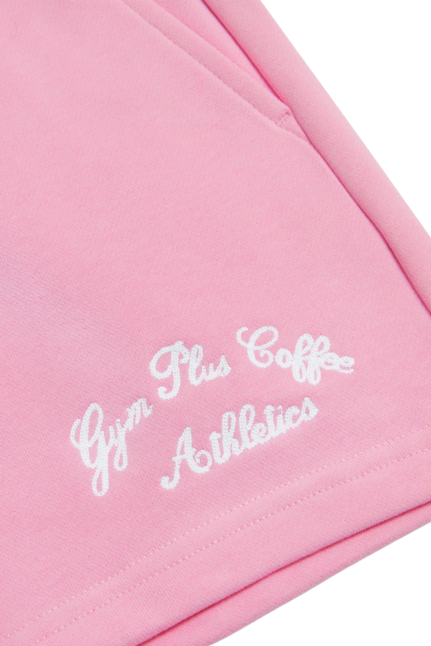 Detail of white embroidery on Gym+Coffee Daily Cotton Shorts in Pink Blossom by gym+coffee, shop gym+coffee at Dotique