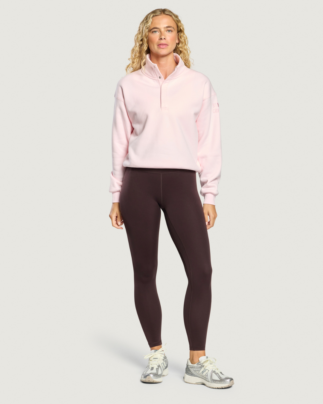 Gym+Coffee Daily Snap Collar Sierra Sweatshirt Ballet Pink worn by model Shop Gym+Coffee at Dotique