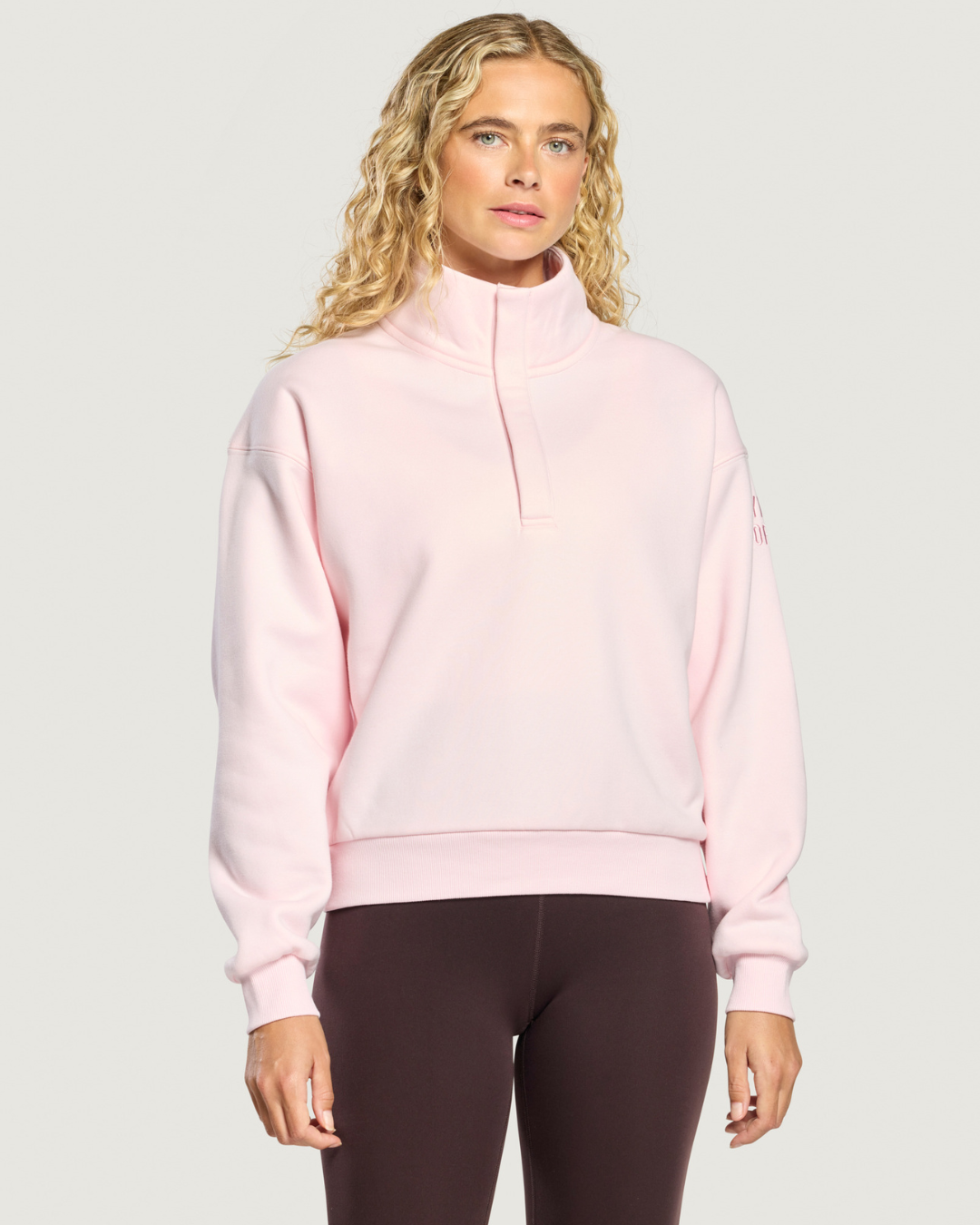 Gym+Coffee Daily Snap Collar Sierra Sweatshirt Ballet Pink worn by model Shop Gym+Coffee at Dotique