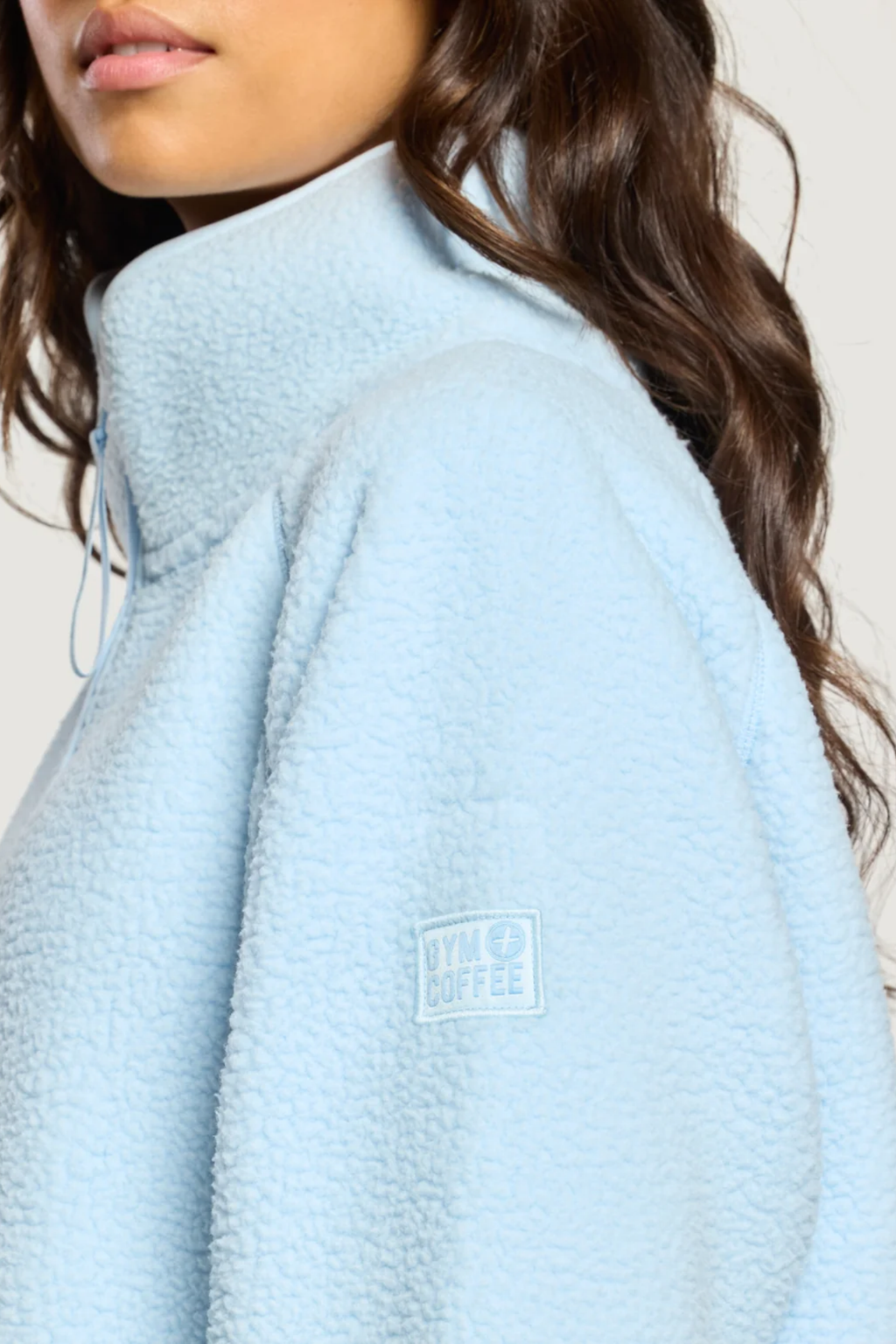 Gym+Coffee Horizon Longline Half Zip Glacial Blue by Gym+Coffee, light blue fleece. Shop Gym+Coffee at Dotique.