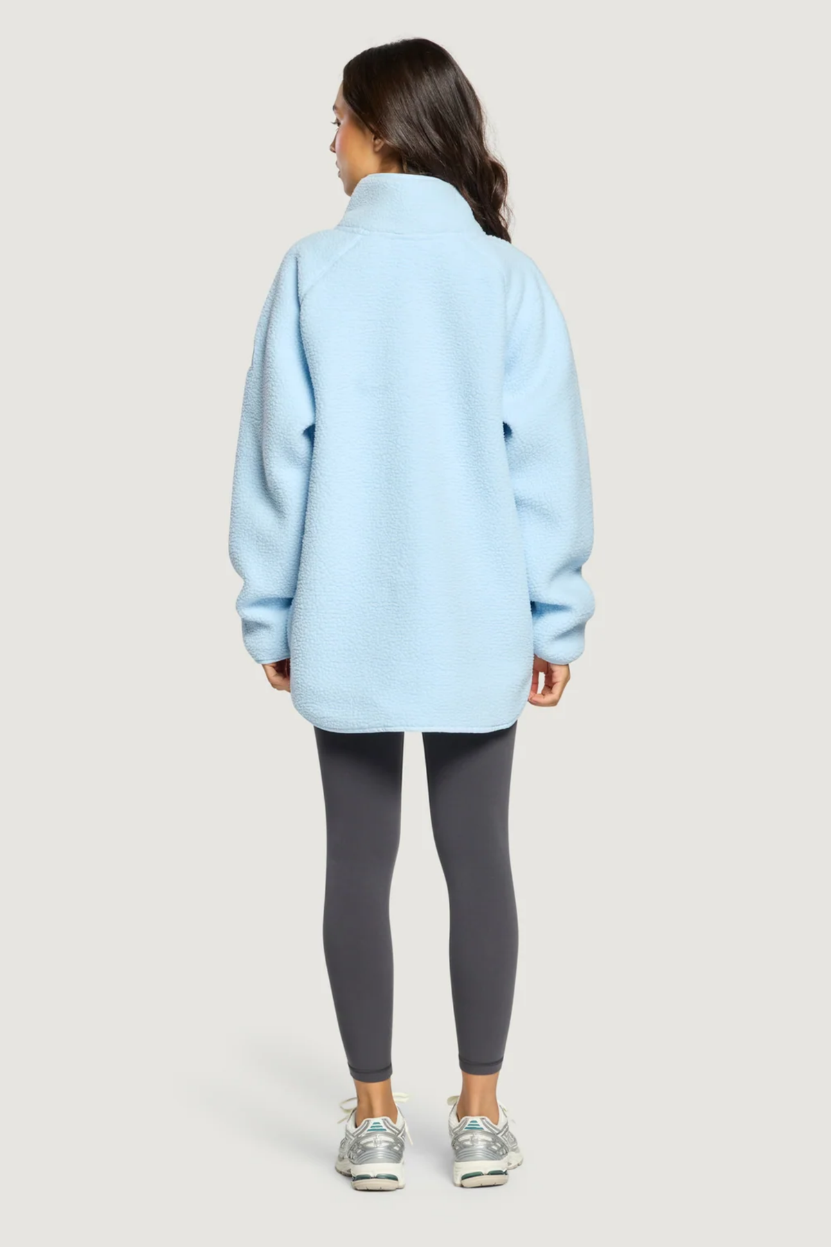 Gym+Coffee Horizon Longline Half Zip Glacial Blue shown from the back. Shop Gym+Coffee at Dotique.
