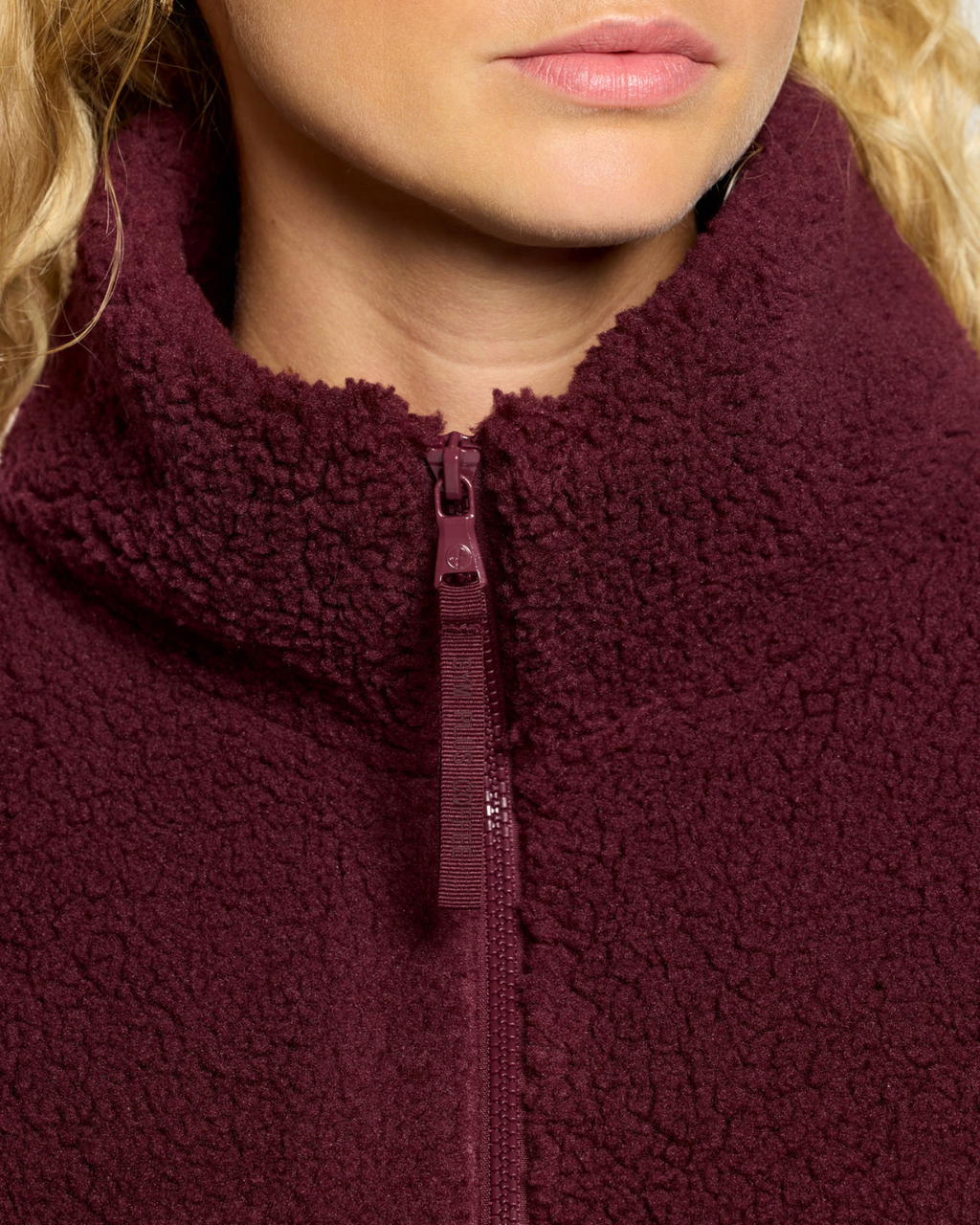 Gym+Coffee Industry Fleece High Collar Jacket Cherry Crush close up. You can Shop Gym+Coffee at Dotique