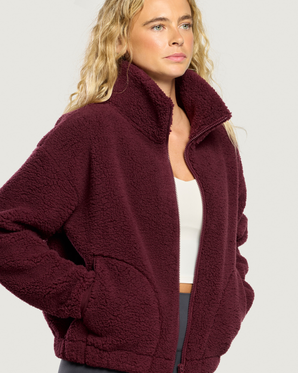 Gym+Coffee Industry Fleece High Collar Jacket Cherry Crush worn by a model. Shop Gym+Coffee at Dotique.