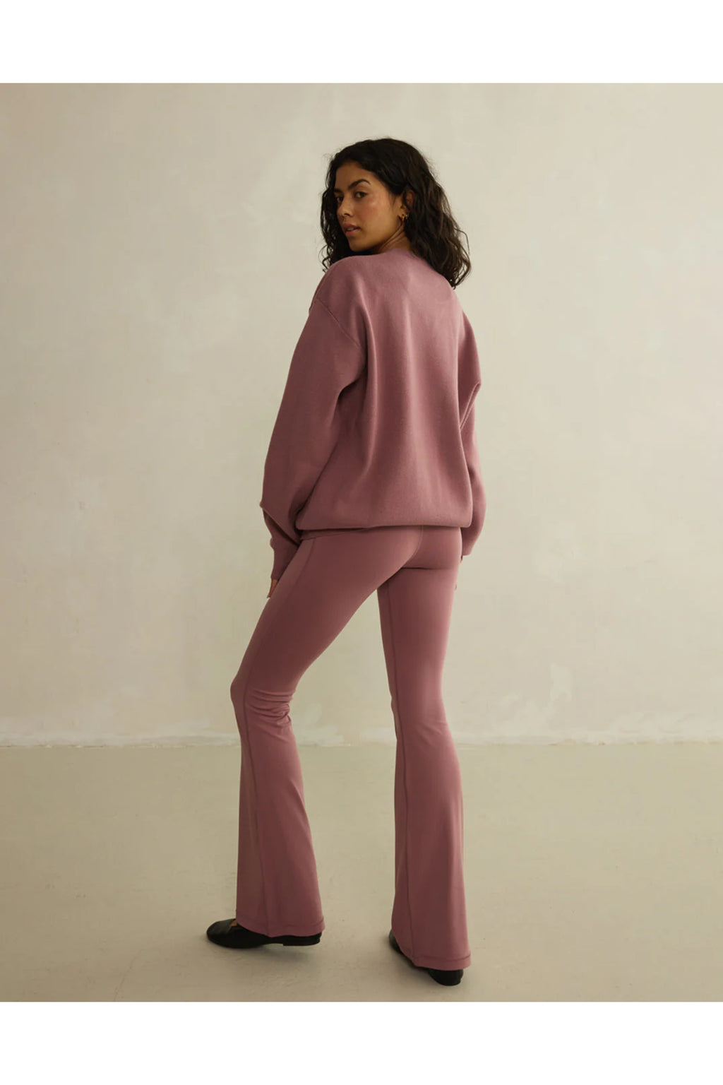 Gym+Coffee Knit Crew in Terra Rose shown from back on model, soft breathable fabric, shop Gym+Coffee at Dotique