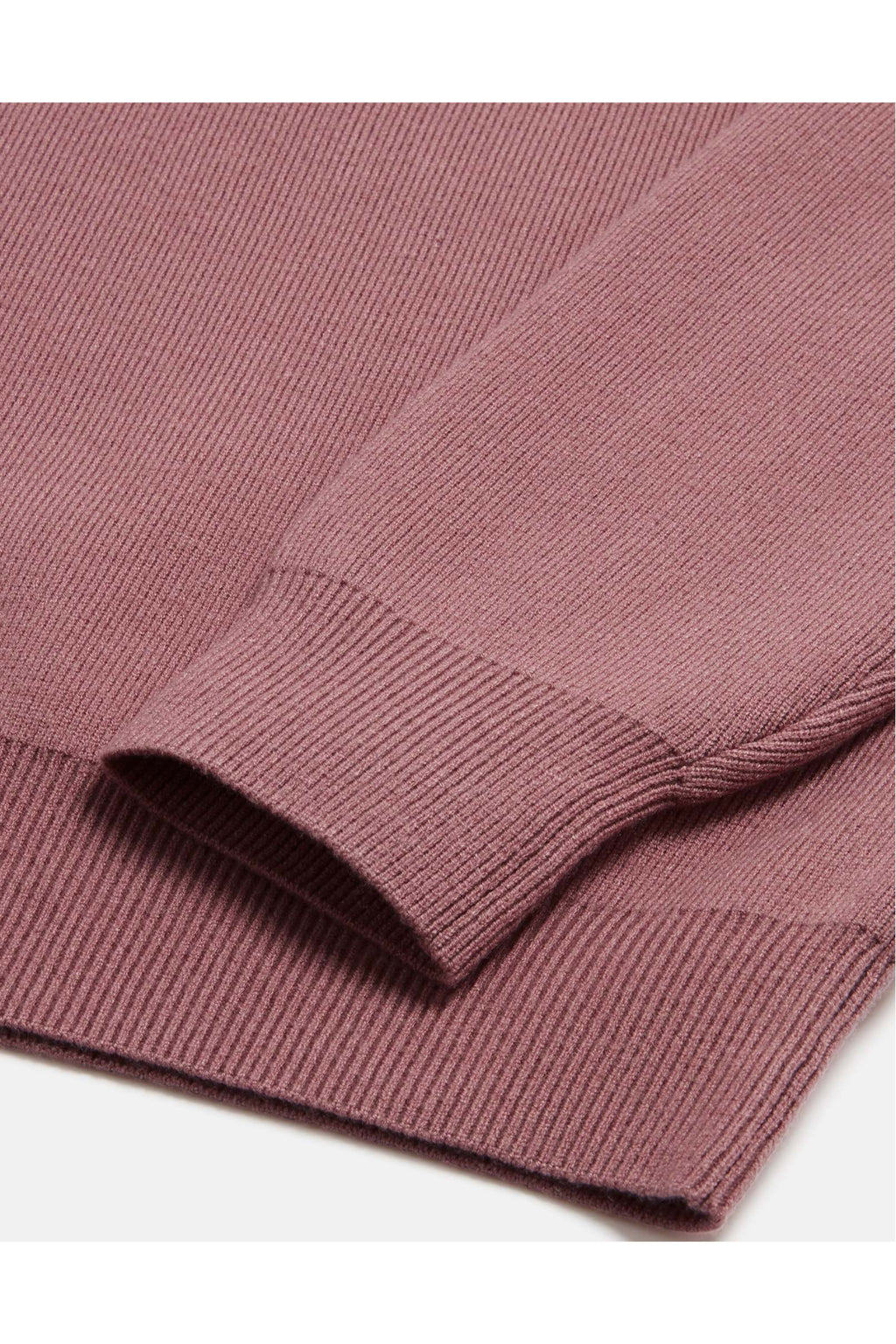 Close-up of sleeve and hem details on Gym+Coffee Knit Crew in Terra Rose, shop Gym+Coffee at Dotique for soft activewear