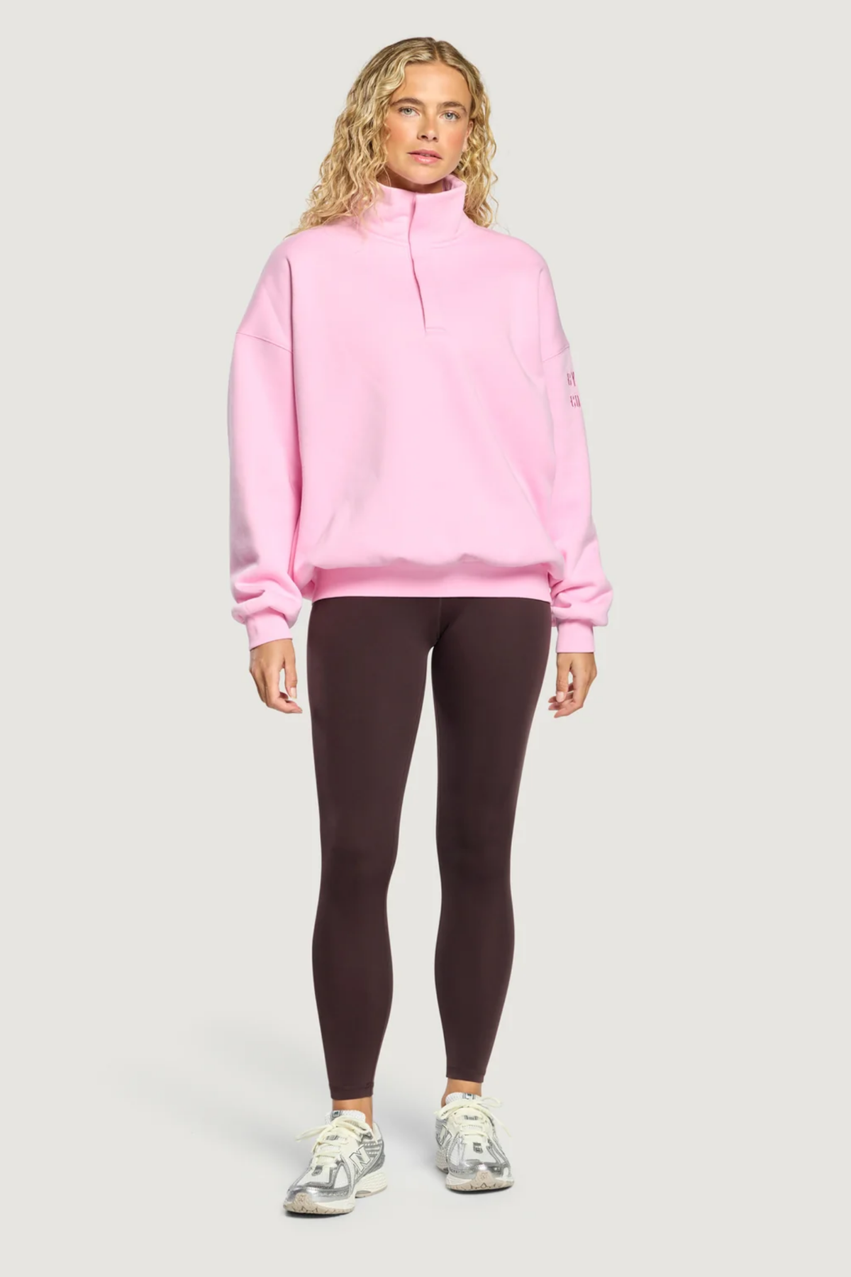 Gym+Coffee Knit Snap Collar Sierra Sweatshirt Pink Blossom worn by model Shop Gym+Coffee at Dotique