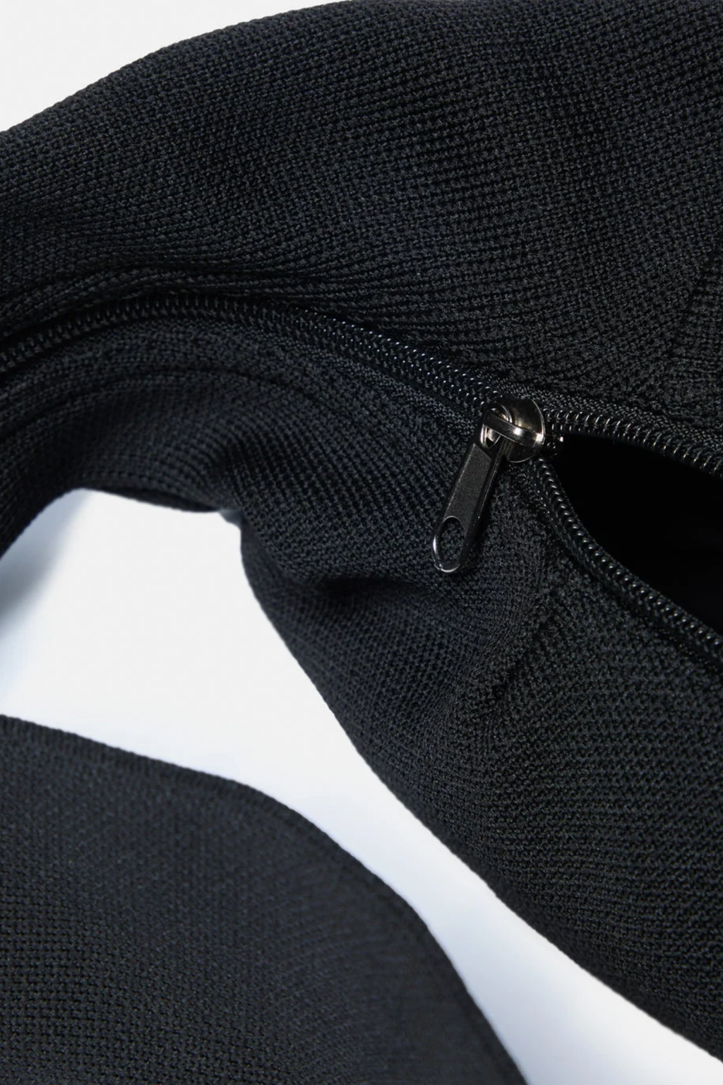 Gym+Coffee Roam Crossbody Bag Black by Gym+Coffee with black textured fabric and zip pocket Shop Gym+Coffee at Dotique