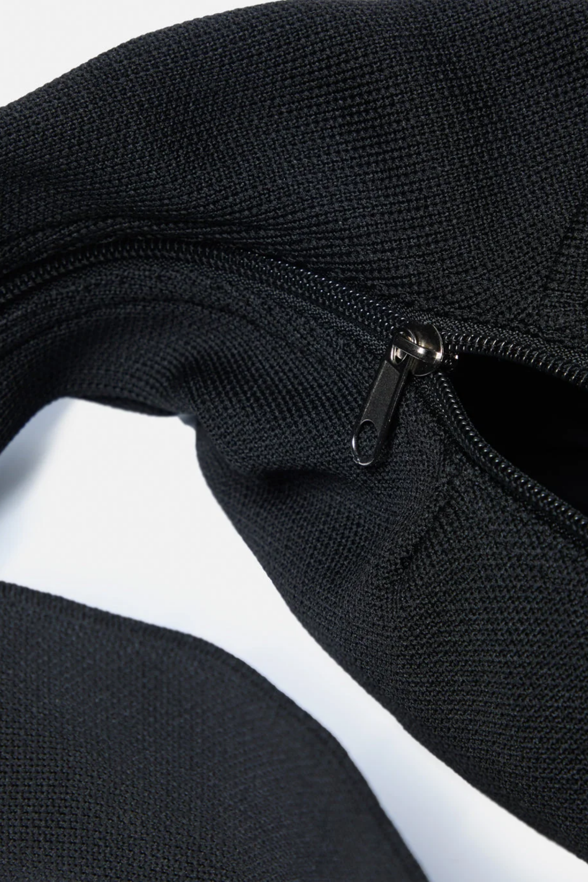 Gym+Coffee Roam Crossbody Bag Black by Gym+Coffee with black textured fabric and zip pocket Shop Gym+Coffee at Dotique