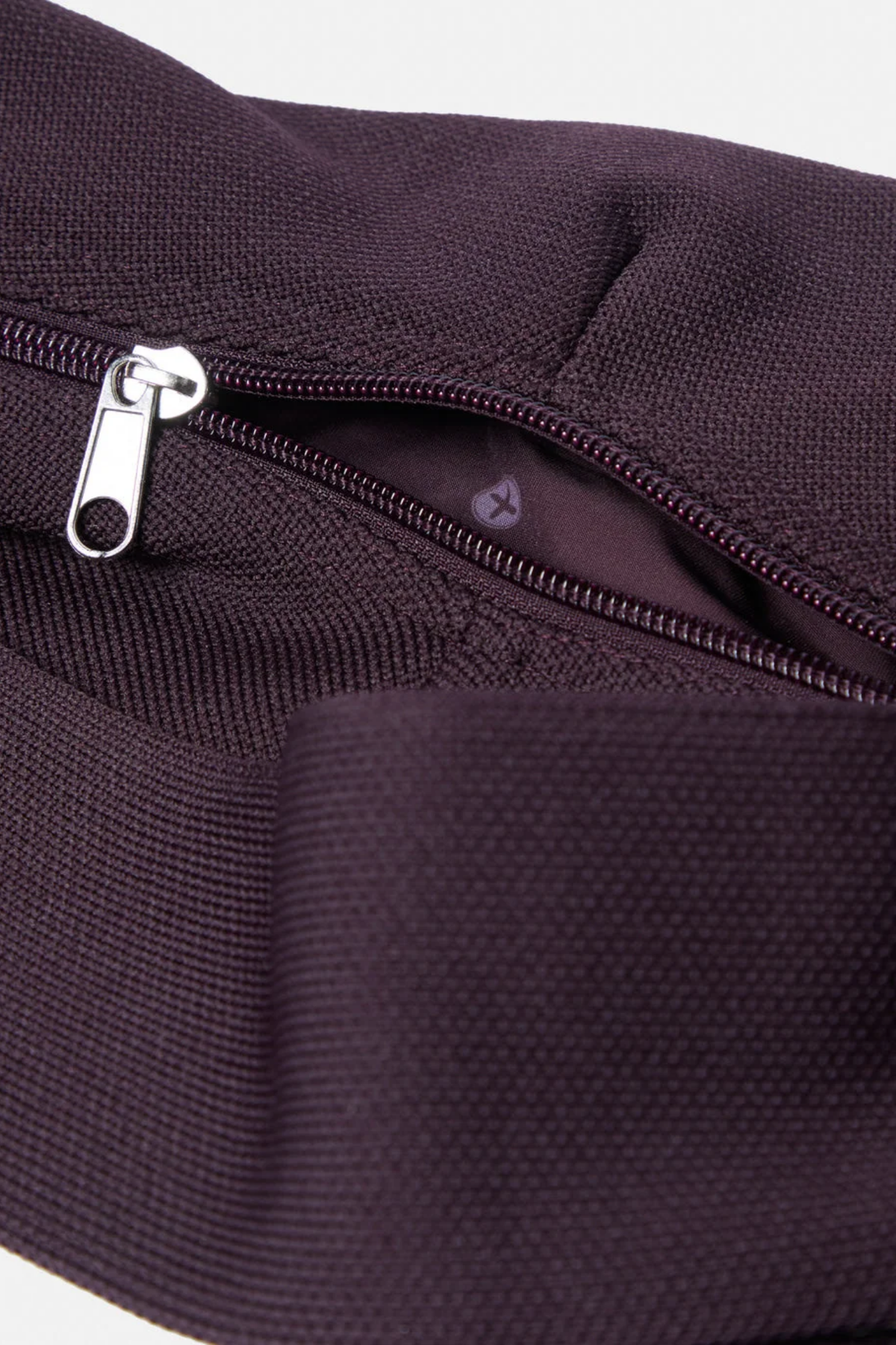 Gym+Coffee Roam Crossbody Bag Mocha Bean close up showing a silver zipper Shop Gym+Coffee at Dotique