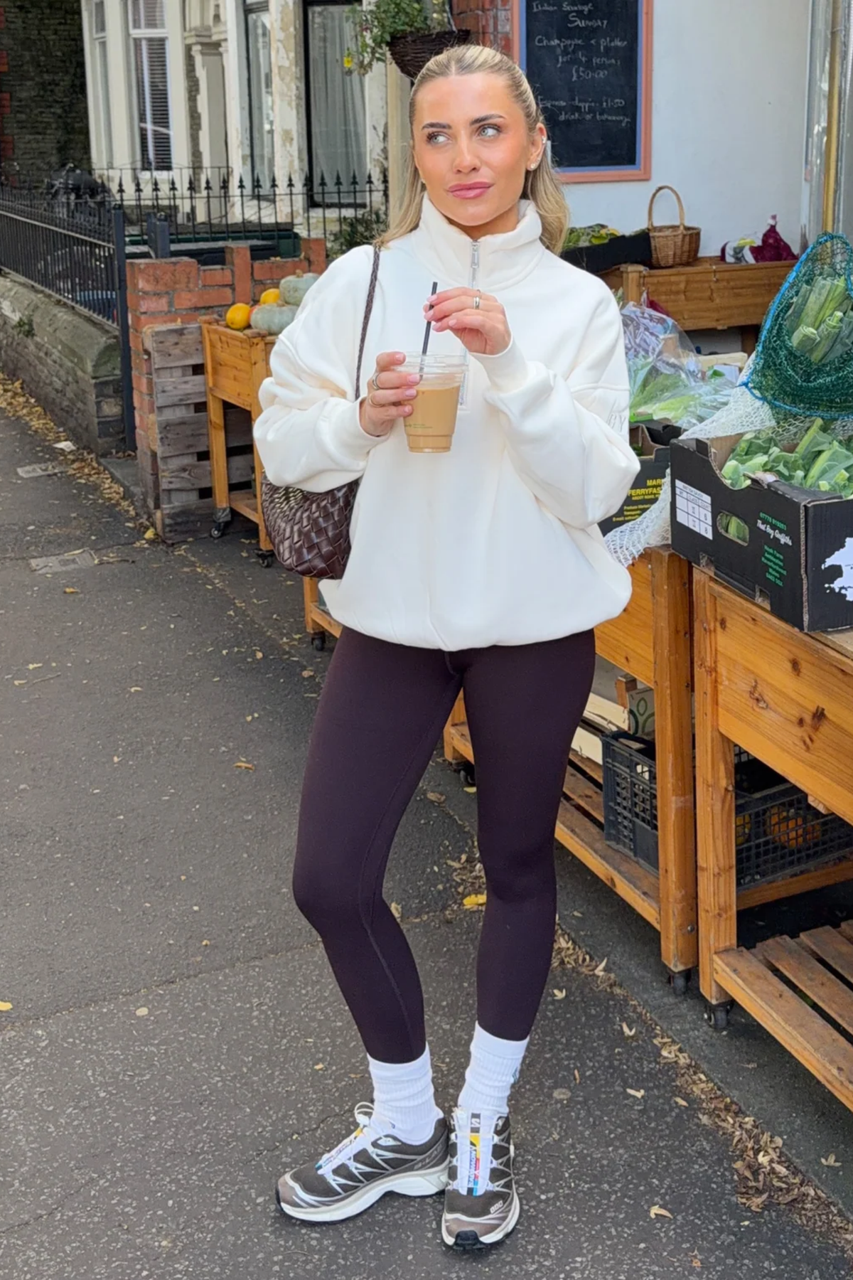 Gym+Coffee Sierra Half Zip Sweatshirt Ecru worn by woman You can Shop Gym+Coffee at Dotique