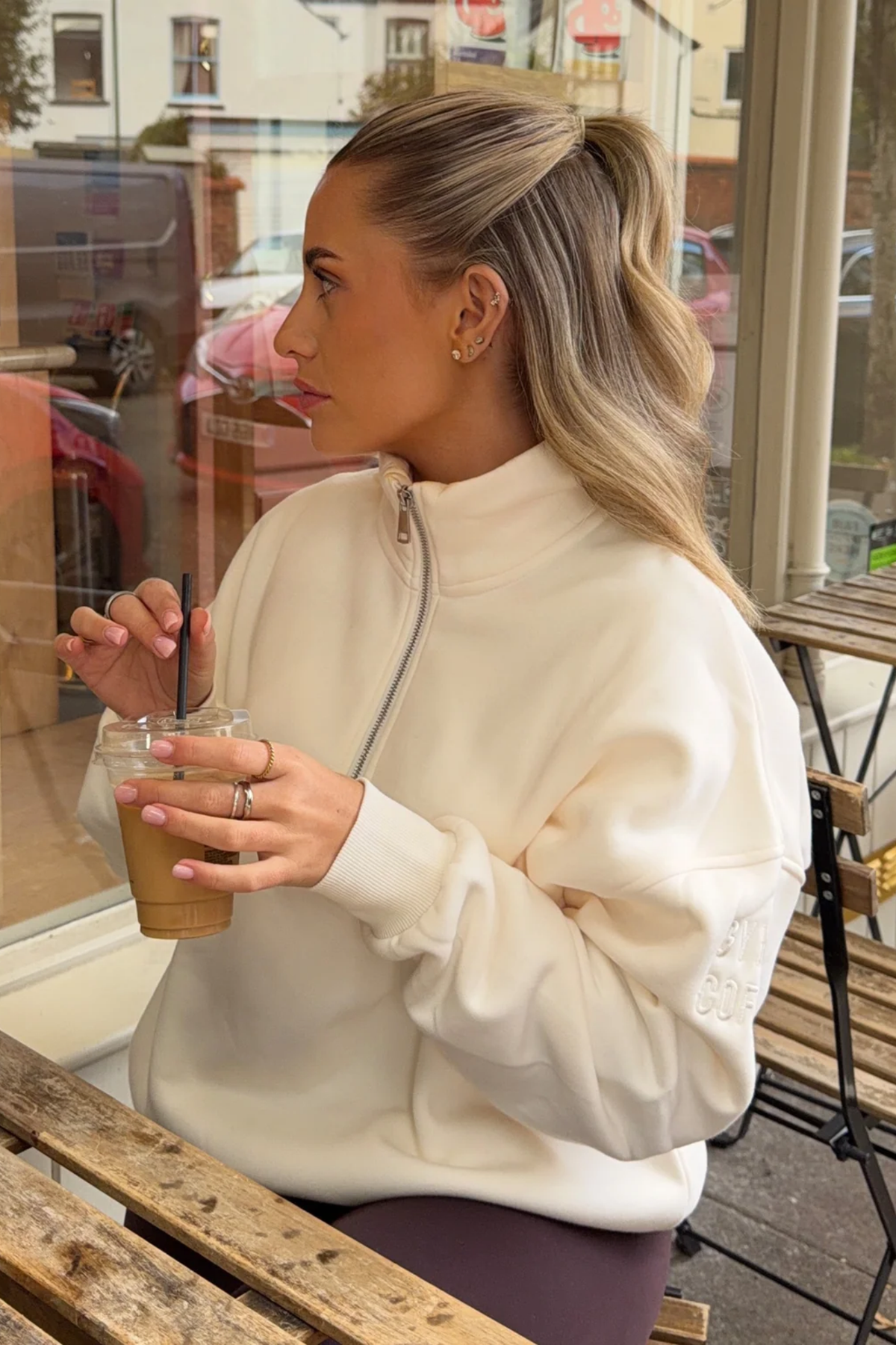 Gym+Coffee Sierra Half Zip Sweatshirt Ecru woman wearing it Shop Gym+Coffee at Dotique