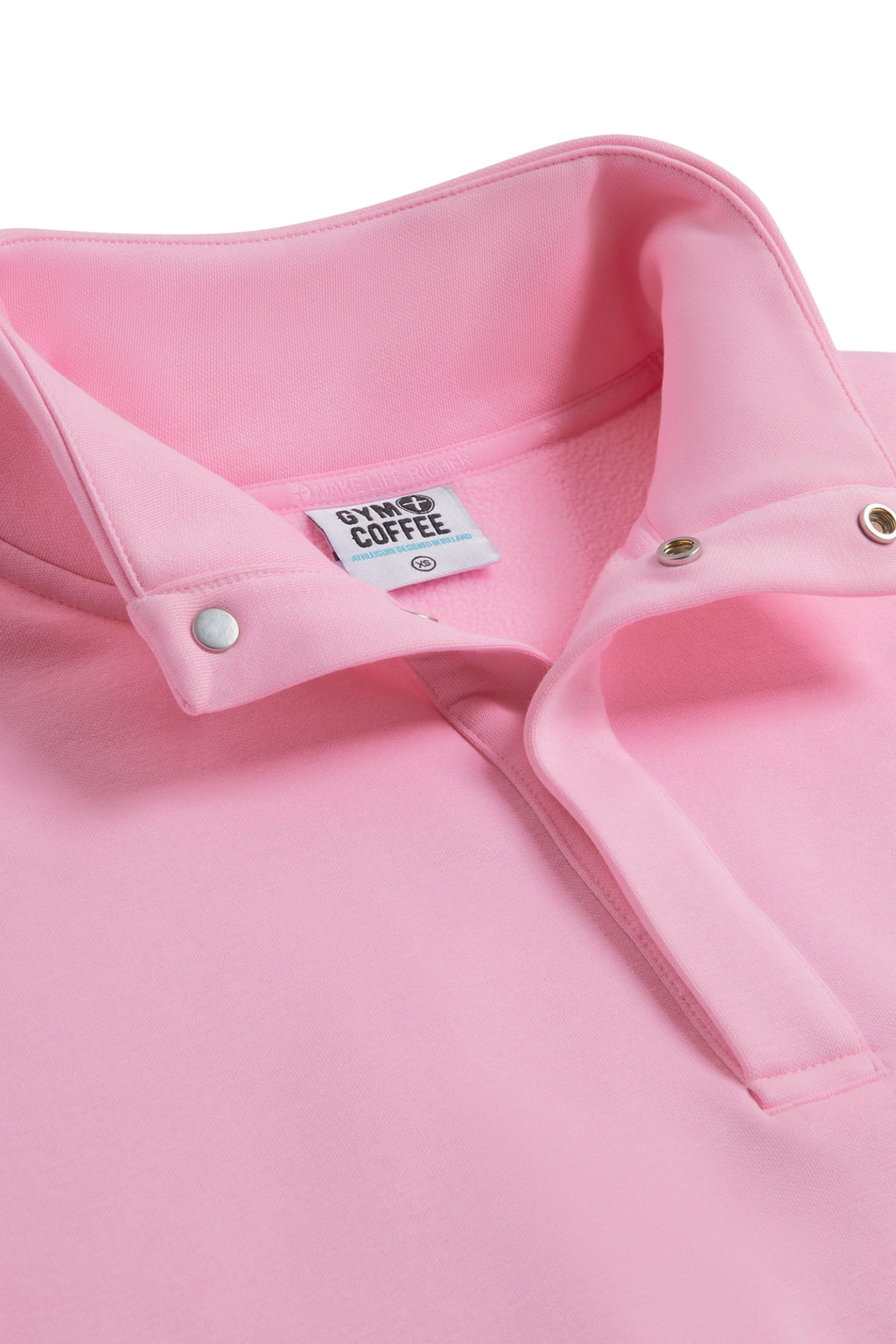 Close-up of Snap Collar High Waist Sweatshirt Pink Blossom by gym+coffee, shop gym+coffee at Dotique in soft pink fabric.