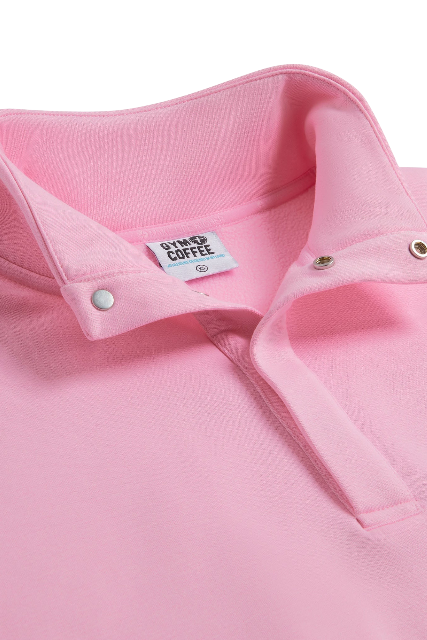 Close-up of Snap Collar High Waist Sweatshirt Pink Blossom by gym+coffee, shop gym+coffee at Dotique in soft pink fabric.