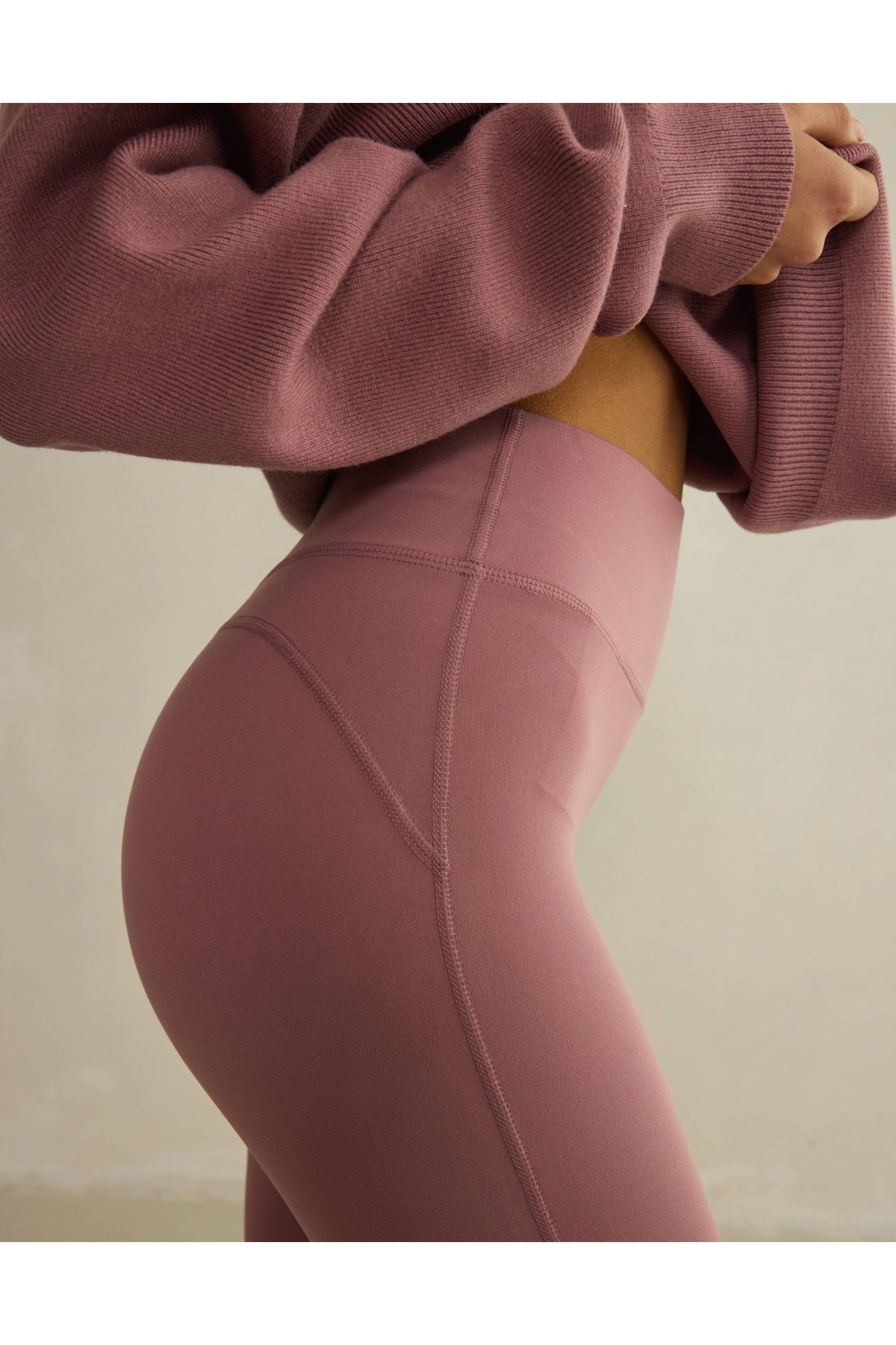 Gym+Coffee Soft Motion Flares - Terra Rose close-up on hip detail, shop Gym+Coffee at Dotique for versatile activewear