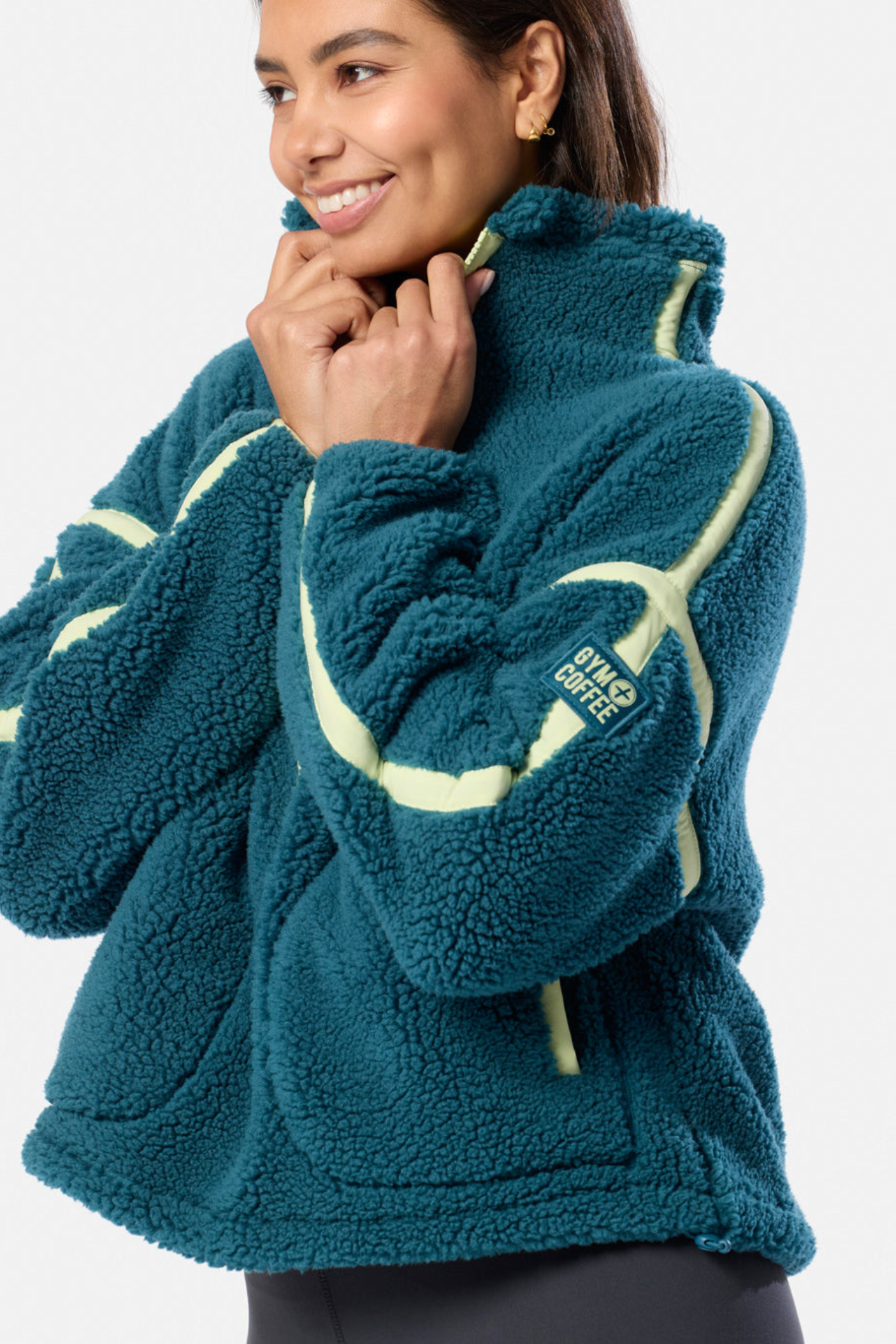 Deep Teal Industry Fleece Half-Zip from Gym+Coffee. Soft, cosy and easy to wear with a relaxed fit and zip detail — perfect for everyday layering. Shop at Dotique.