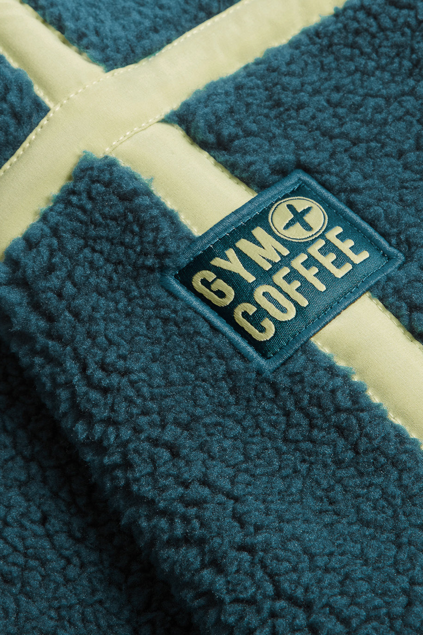 Deep Teal Industry Fleece Half-Zip from Gym+Coffee. Soft, cosy and easy to wear with a relaxed fit and zip detail — perfect for everyday layering. Shop at Dotique.