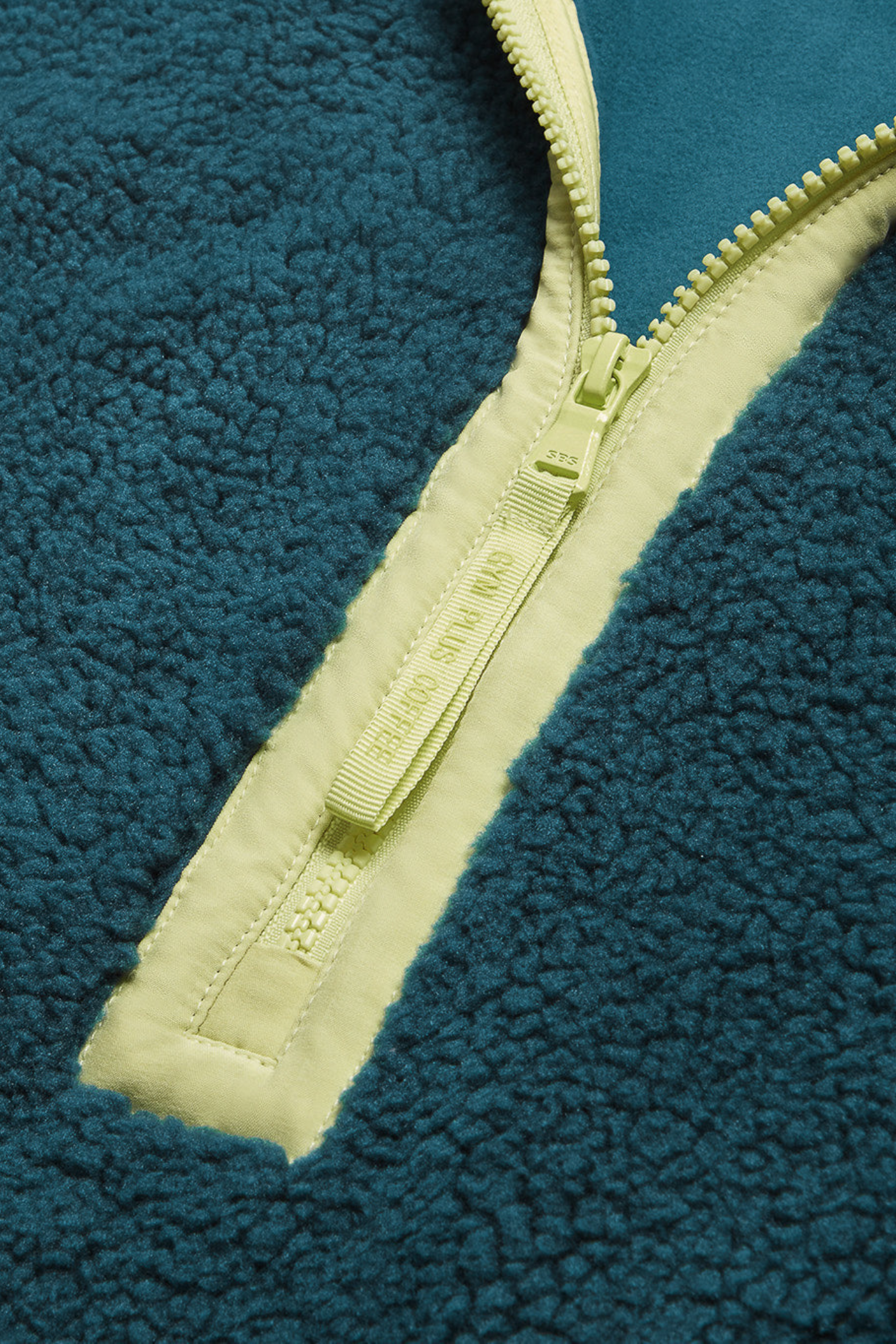 Deep Teal Industry Fleece Half-Zip from Gym+Coffee. Soft, cosy and easy to wear with a relaxed fit and zip detail — perfect for everyday layering. Shop at Dotique.