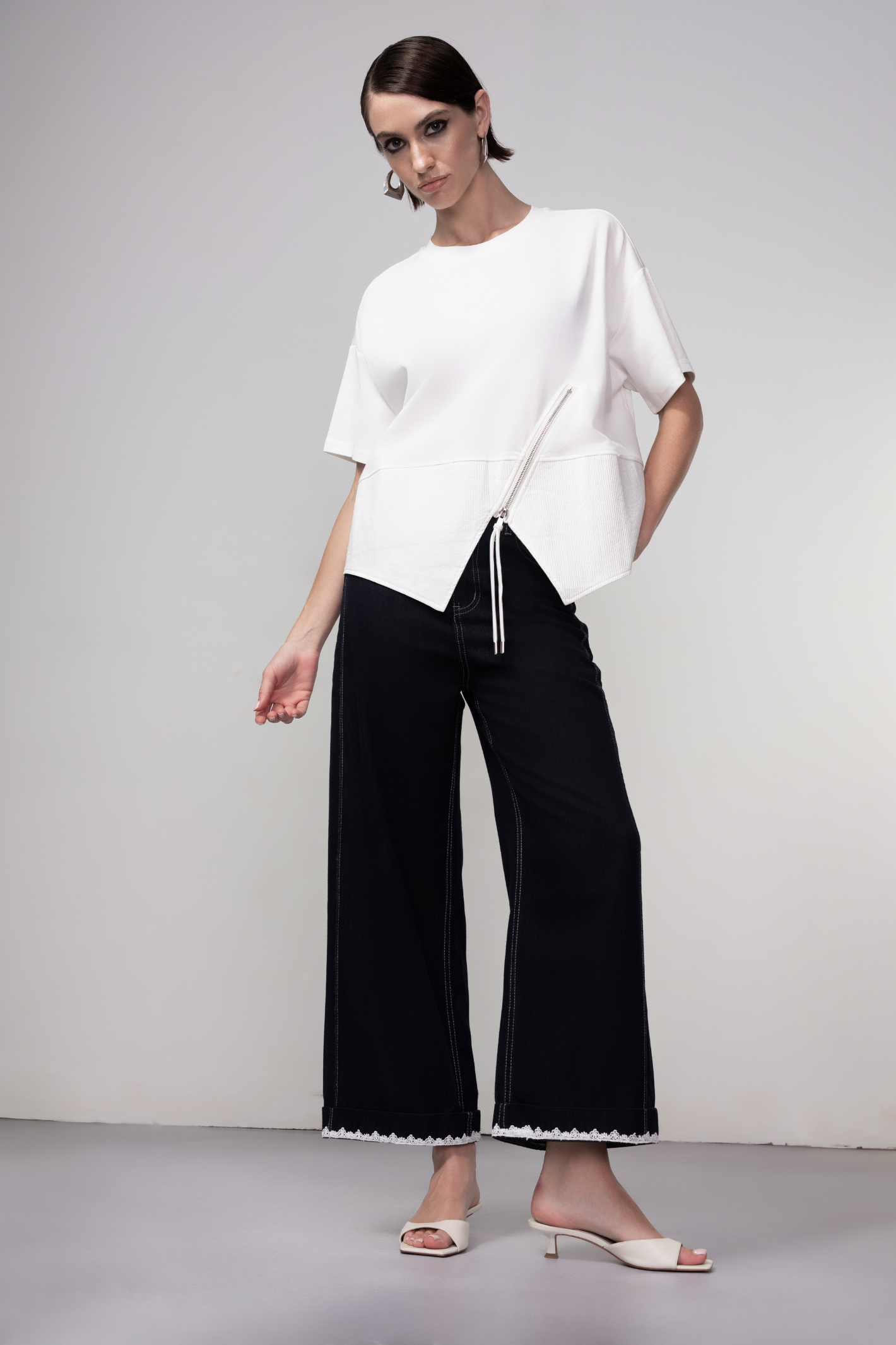 Haako white cotton zip detail top styled in a clean minimalist outfit at Dotique