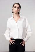 Haako white cotton shirt styled in a modern minimalist outfit at Dotique