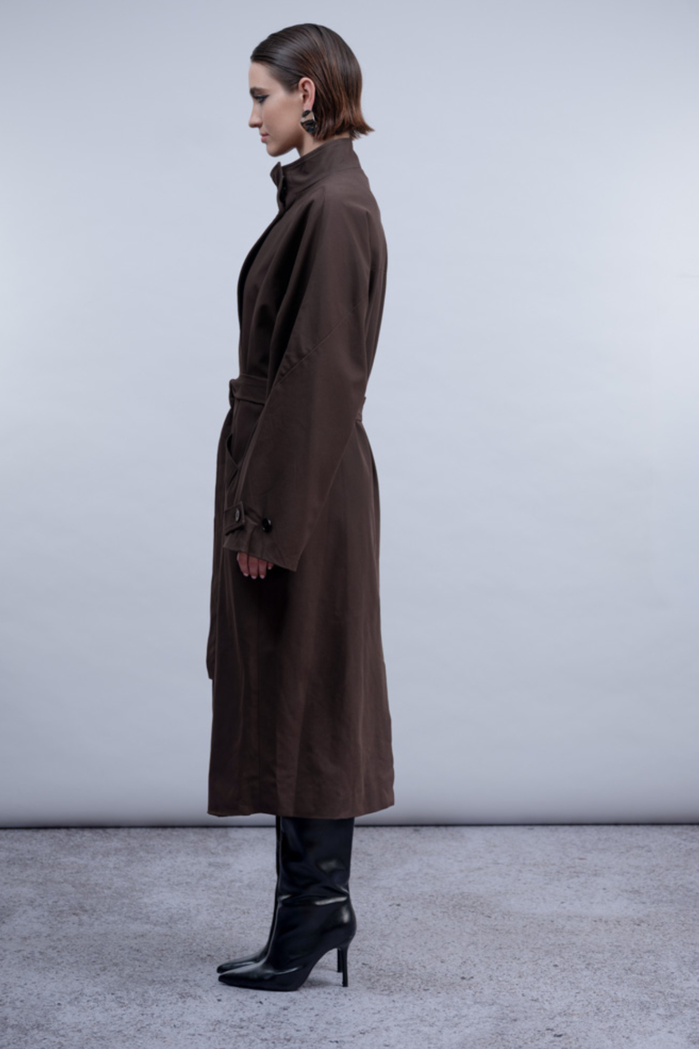 Haako H2031 Longline Coat – Brown A true statement outerwear piece. Shop Haako at Dotique.