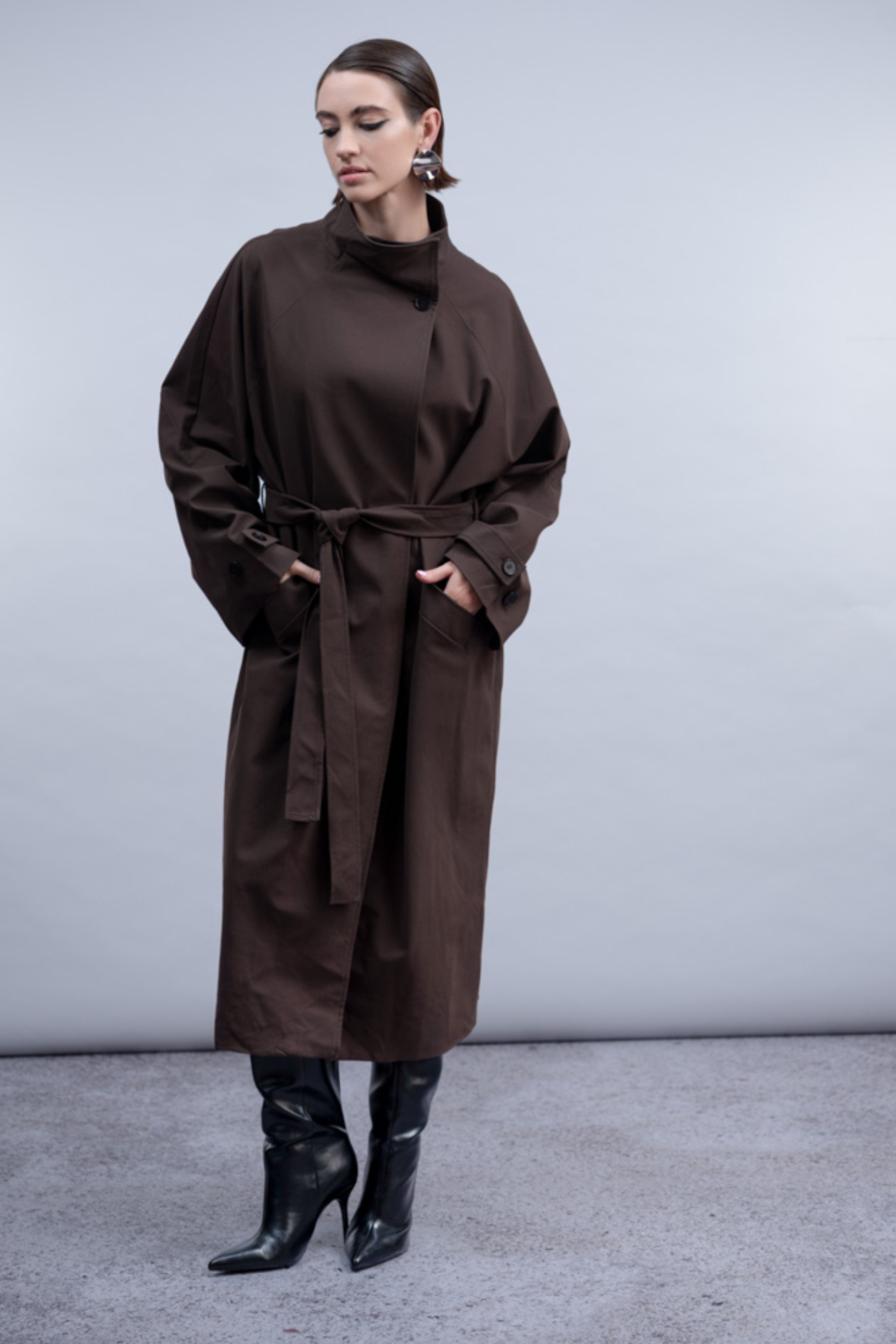 Haako H2031 Longline Coat – Brown A true statement outerwear piece. Shop Haako at Dotique.